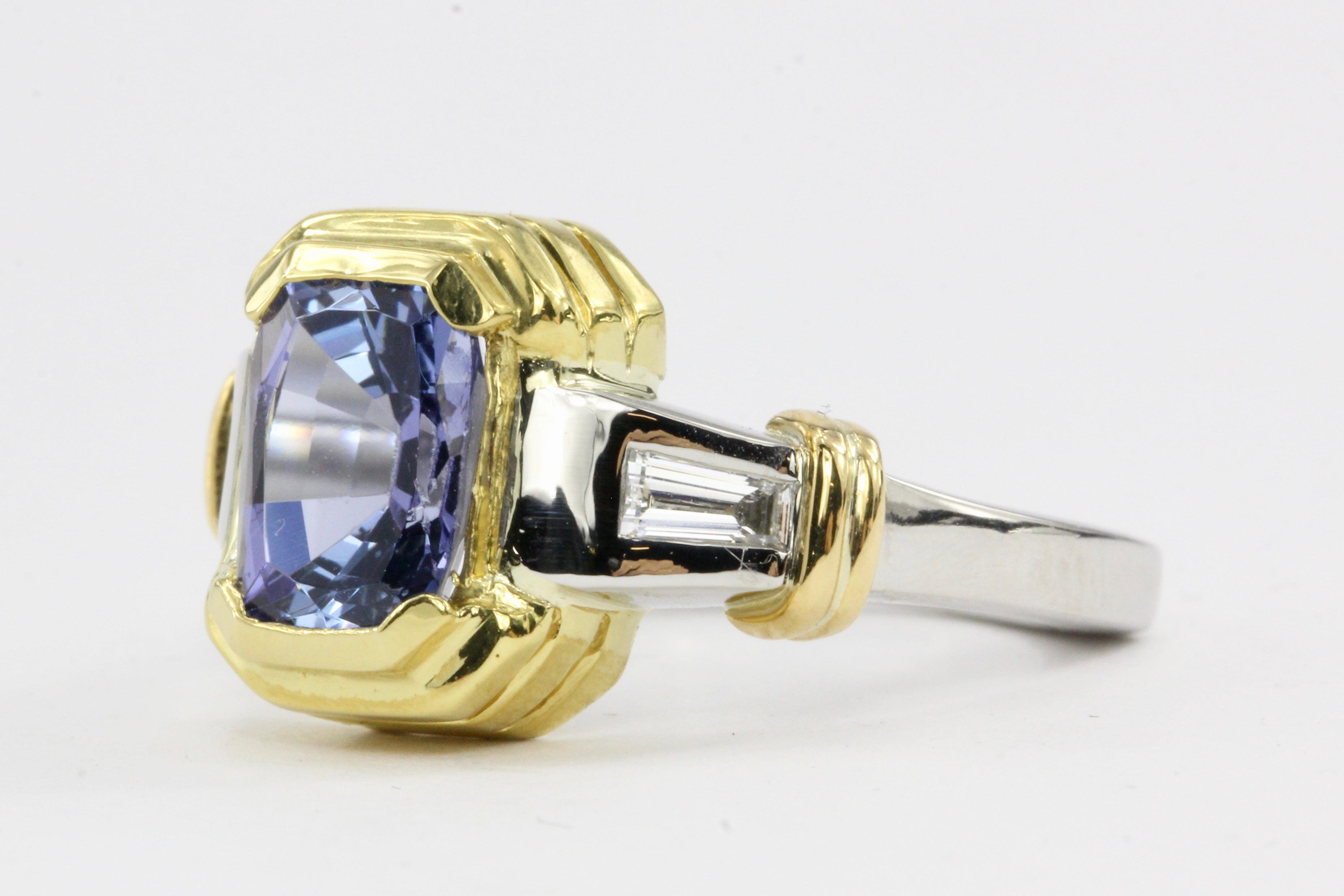 Platinum and 18K Yellow Gold 2.75 CT Tanzanite and .25 CTW Diamond Baguette Ring - Queen May