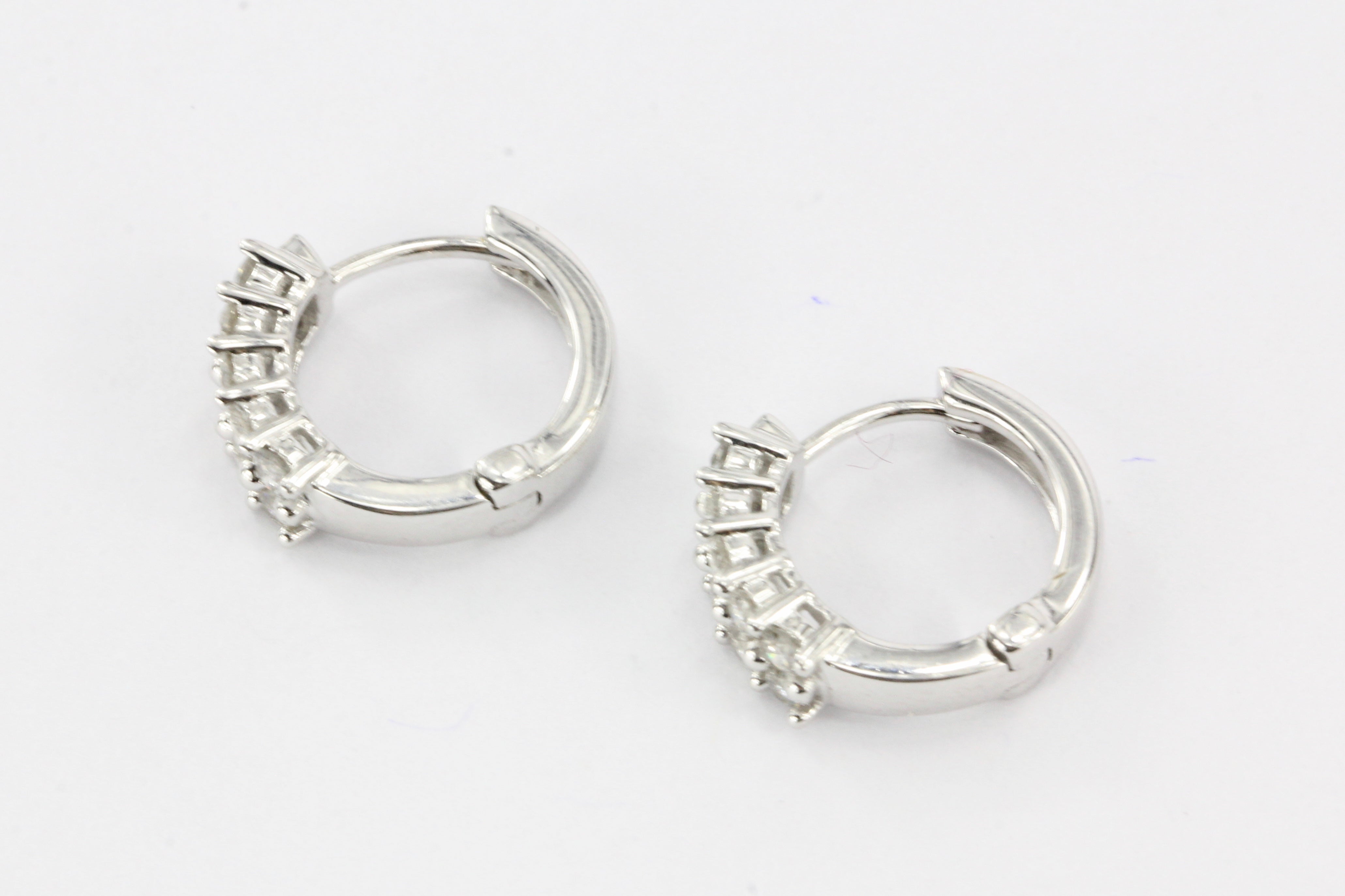 18K White Gold .50 CTW Diamond Huggie Hoop Earrings - Queen May