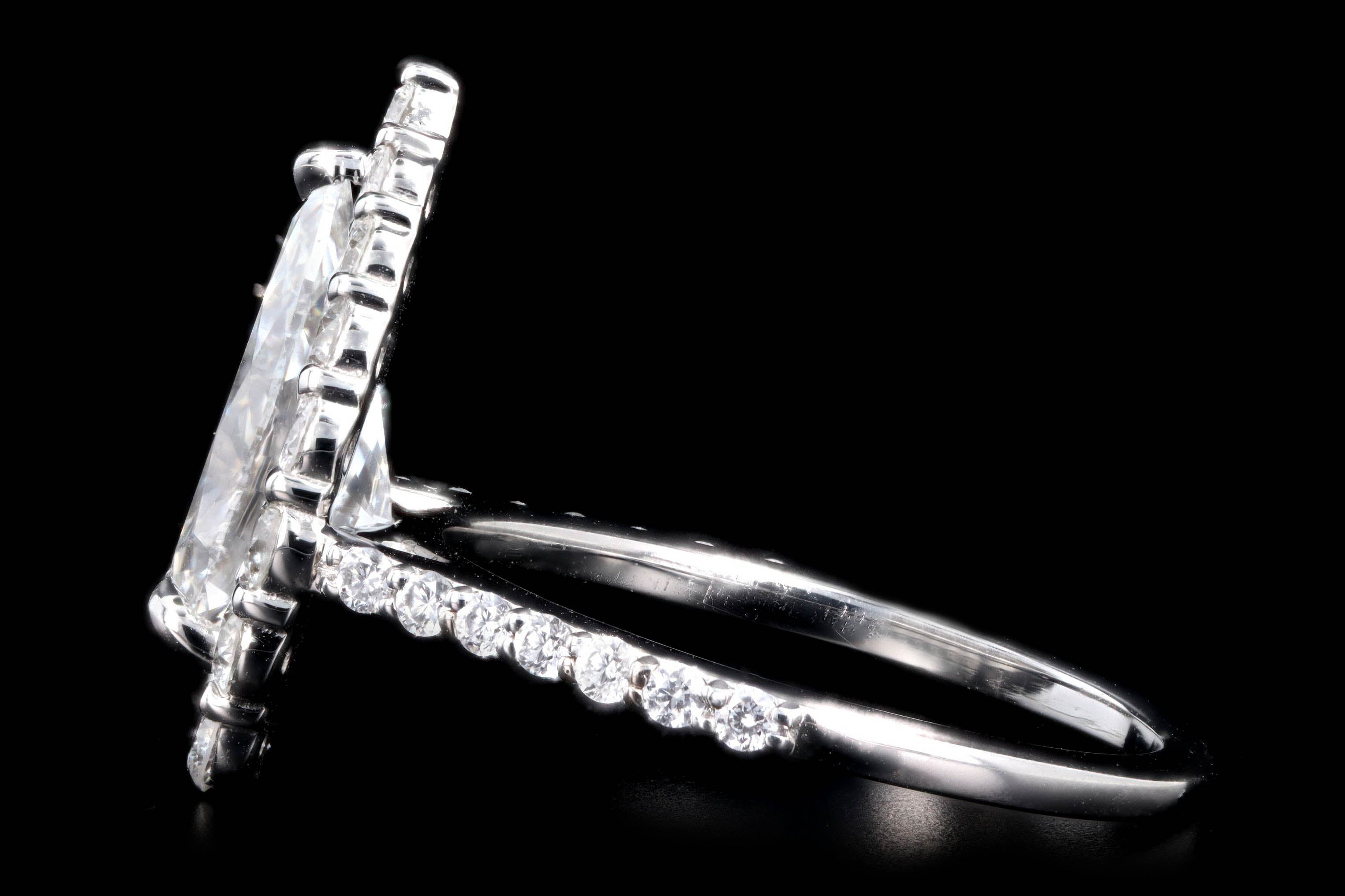 Platinum 2.10 Carat Pear Cut Diamond Graduated Halo Engagement Ring GIA Certified - Queen May