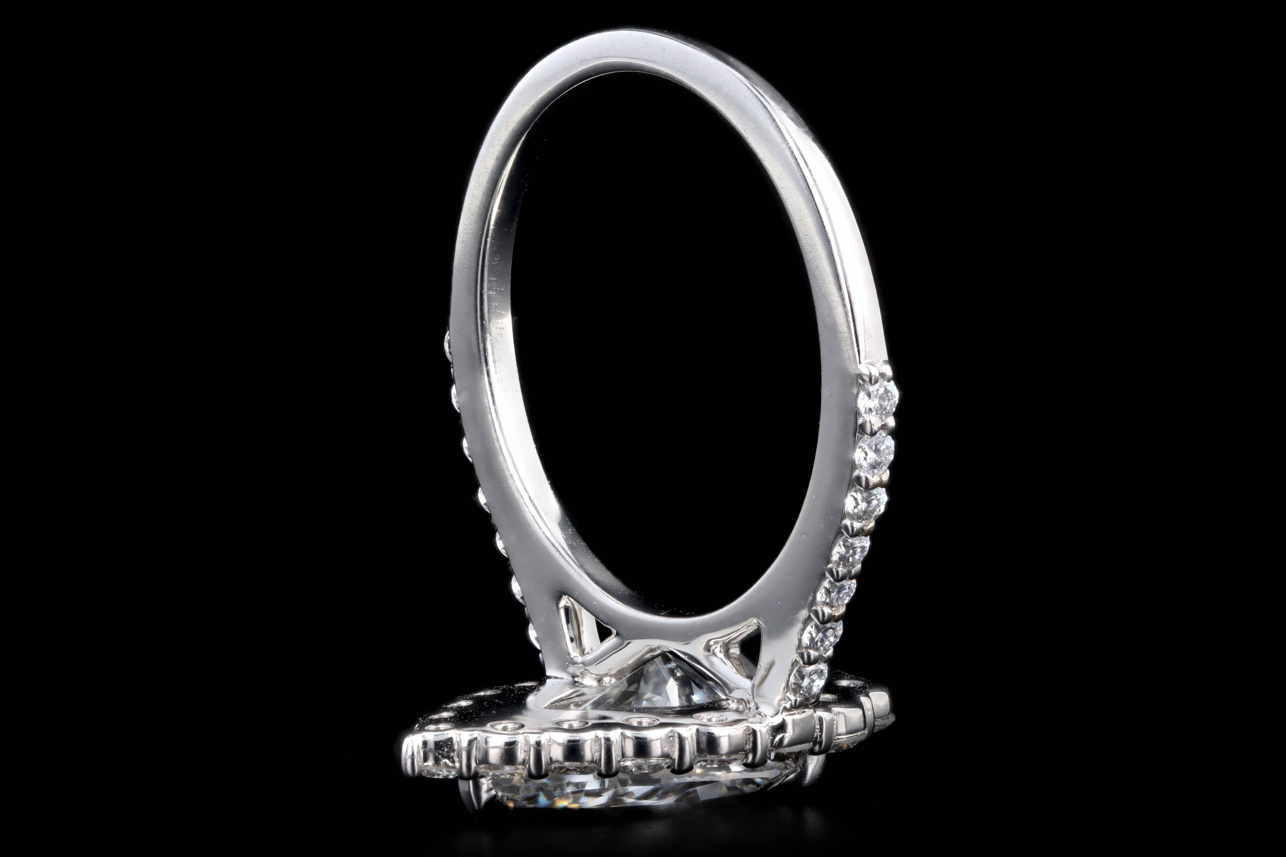 Platinum 2.10 Carat Pear Cut Diamond Graduated Halo Engagement Ring GIA Certified - Queen May