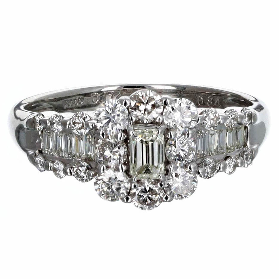0.17 Carat Emerald Cut Diamond Halo Engagement Ring in Platinum - Queen May