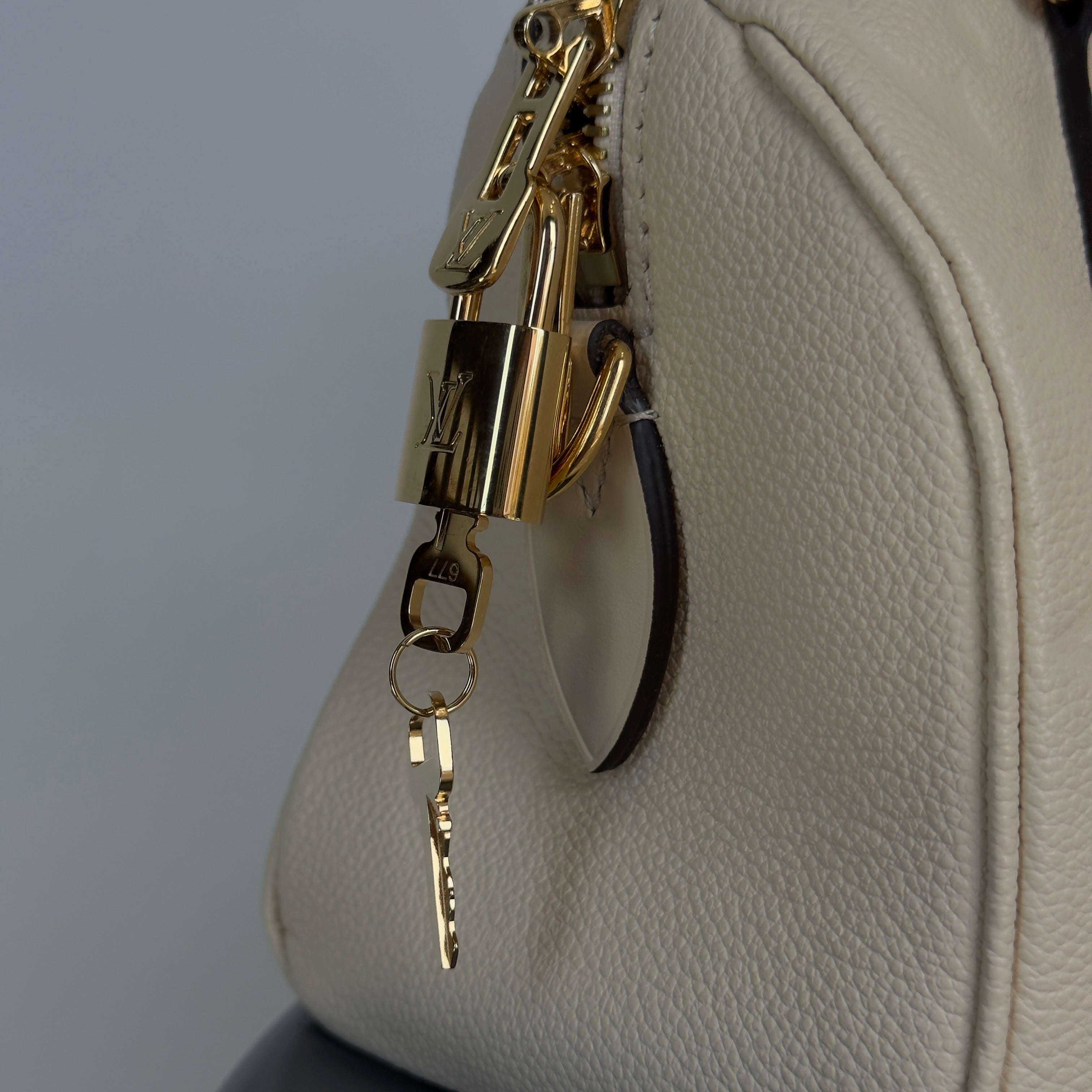Louis Vuitton Empreinte Speedy Bandouliere 20 Creme With Additional Add On Wave Key Charm - Queen May