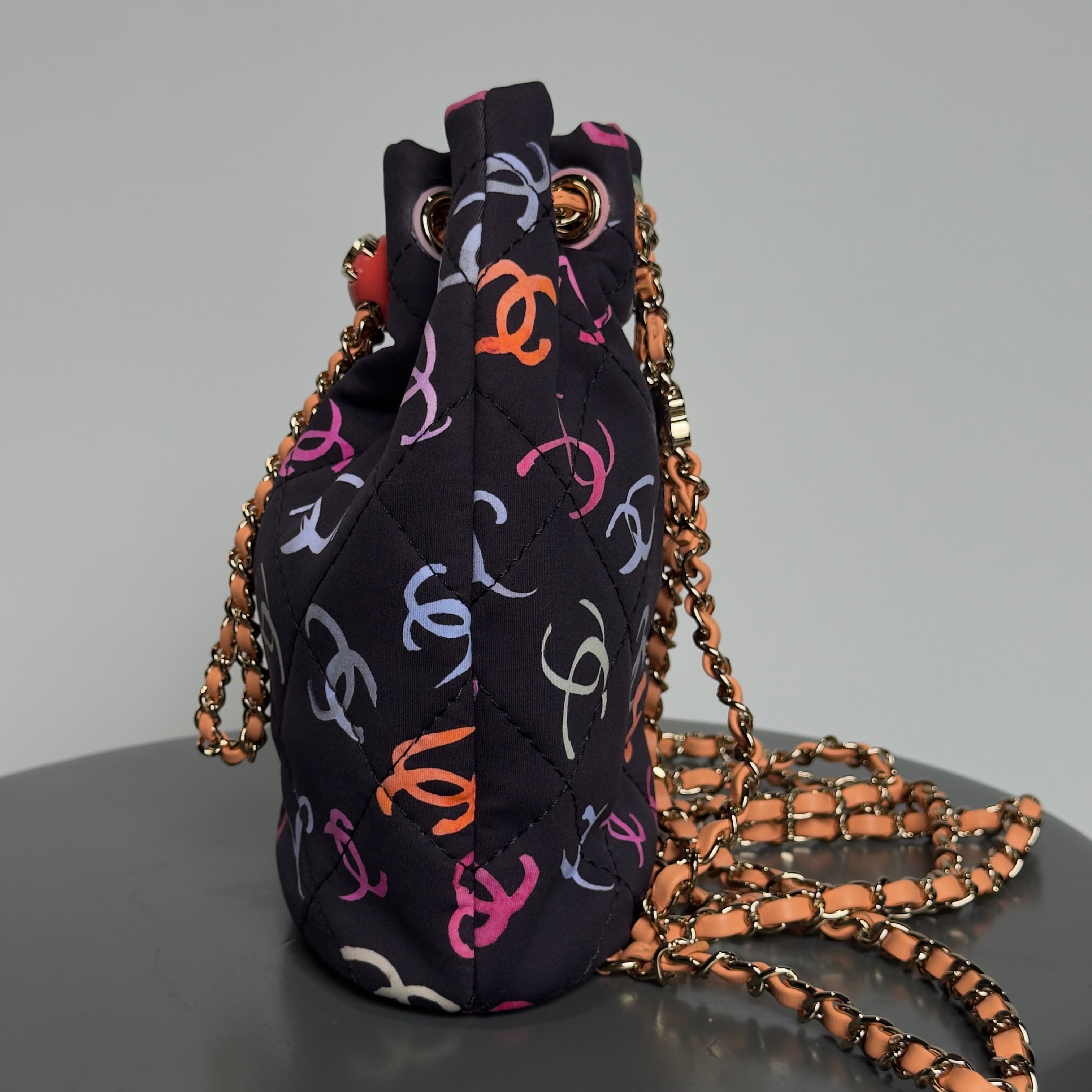 Chanel Medium CC Drawstring Backpack Multicolored Printed Fabric Light Gold Hardware