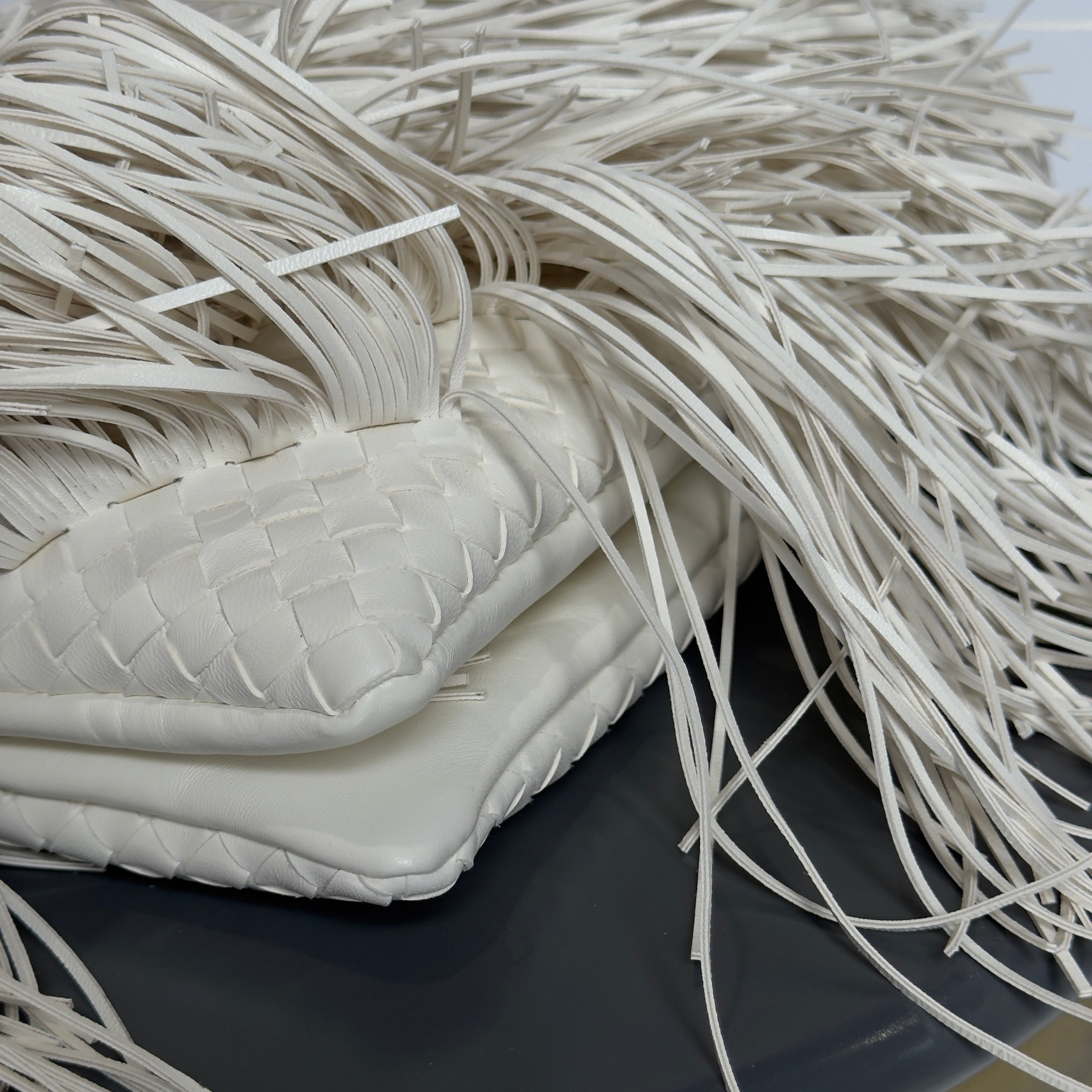 Bottega Veneta Intrecciato Fringe Leather Giornale Pouch In Alabaster