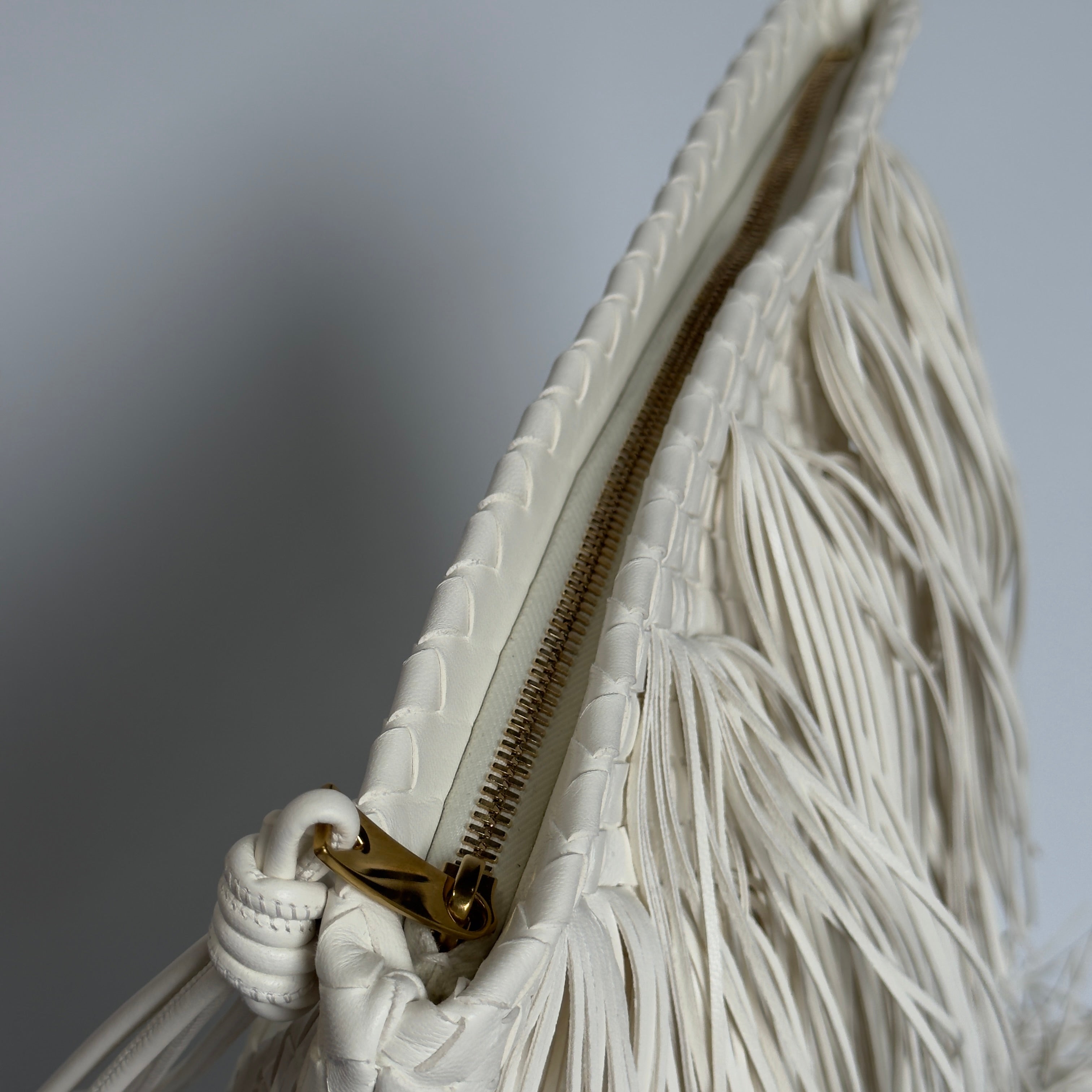 Bottega Veneta Intrecciato Fringe Leather Giornale Pouch In Alabaster