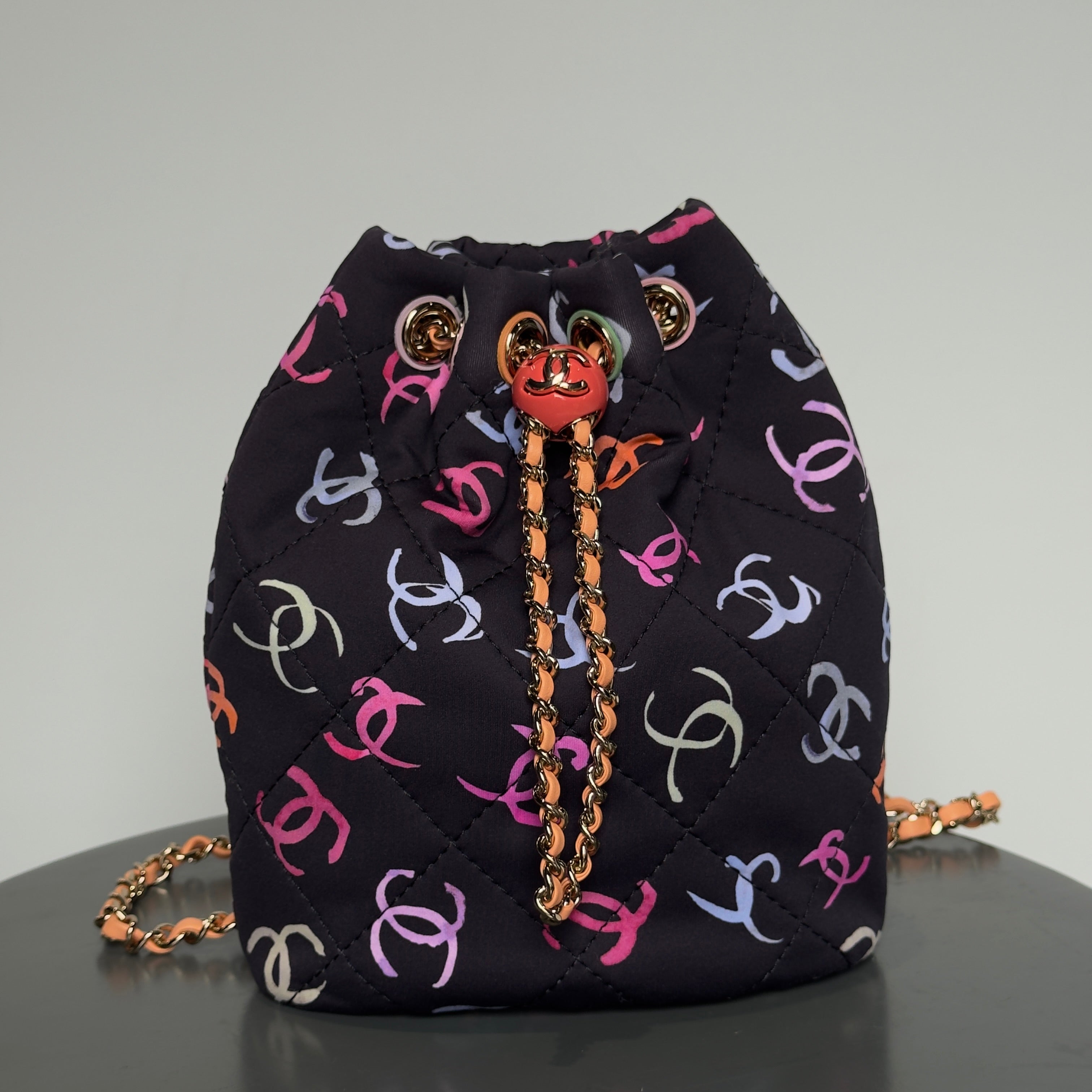Chanel Medium CC Drawstring Backpack Multicolored Printed Fabric Light Gold Hardware