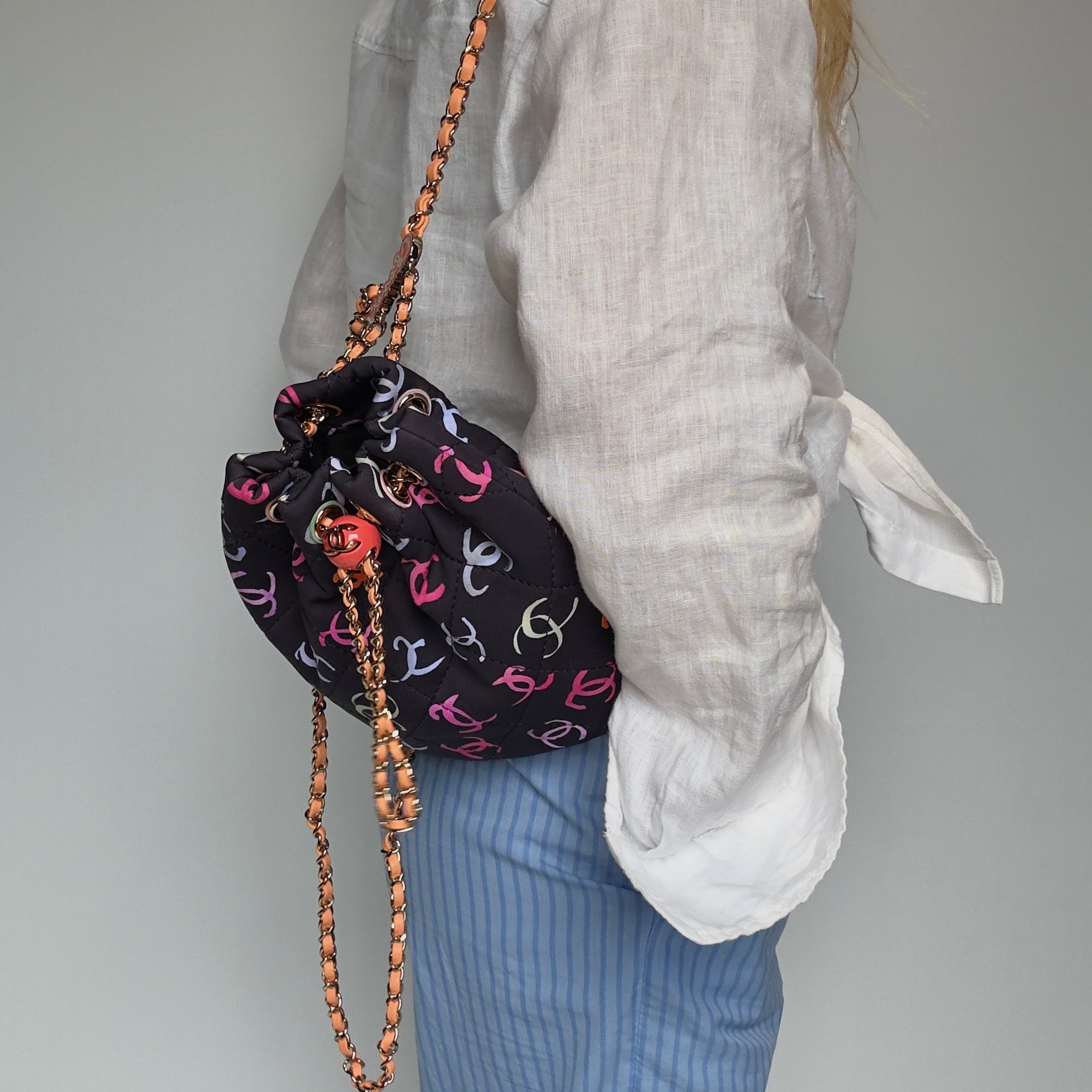 Chanel Medium CC Drawstring Backpack Multicolored Printed Fabric Light Gold Hardware