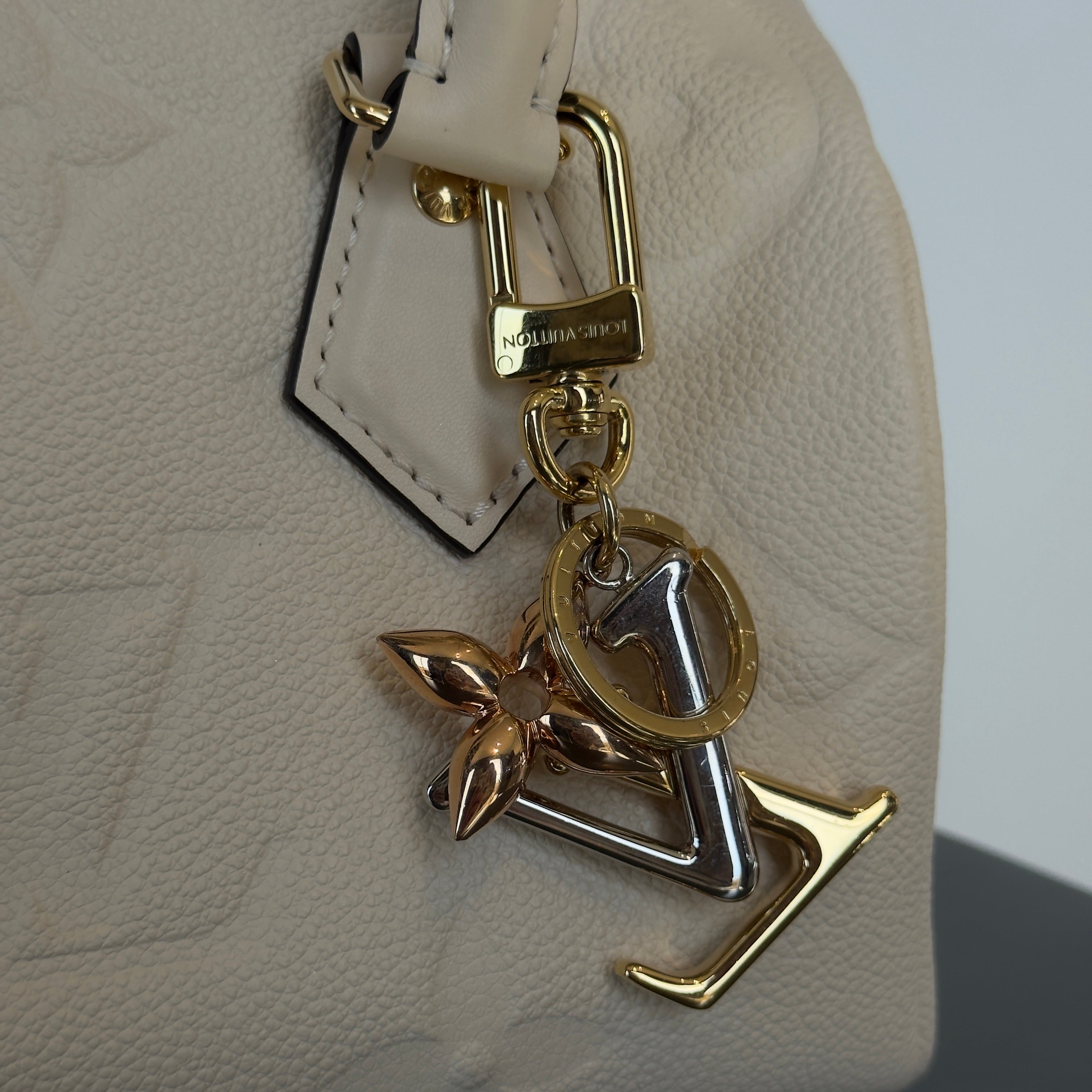 Louis Vuitton Empreinte Speedy Bandouliere 20 Creme With Additional Add On Wave Key Charm - Queen May