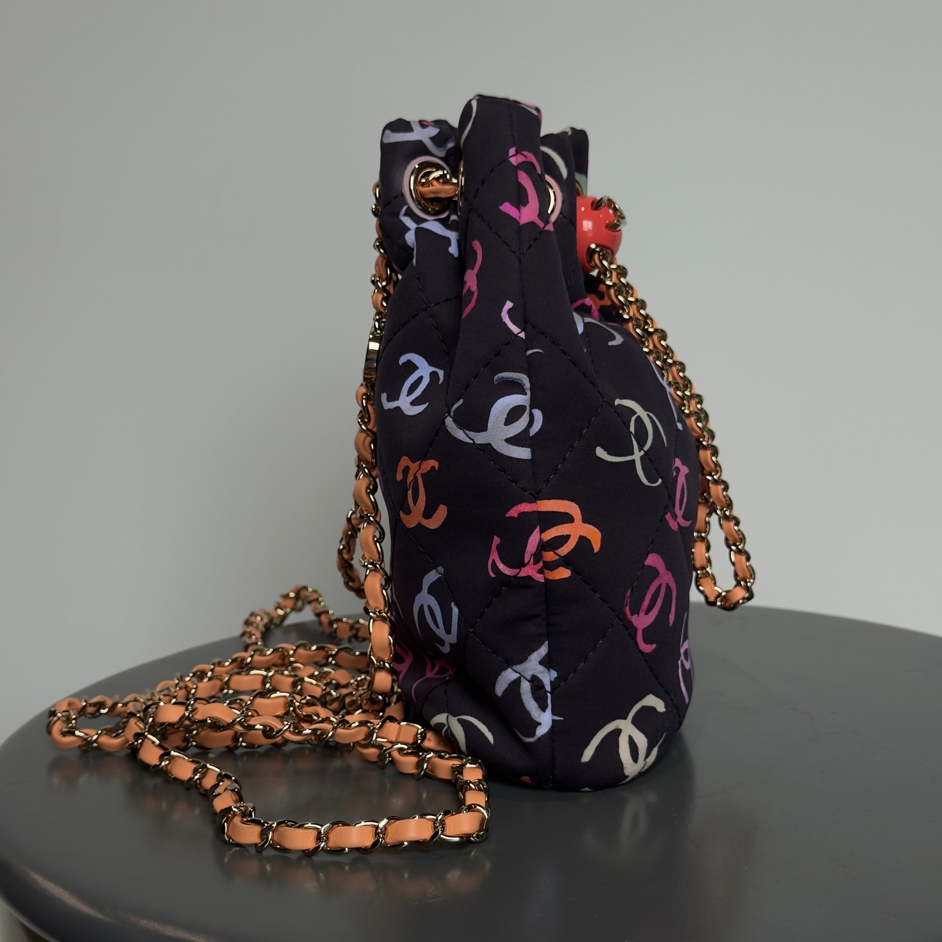 Chanel Medium CC Drawstring Backpack Multicolored Printed Fabric Light Gold Hardware