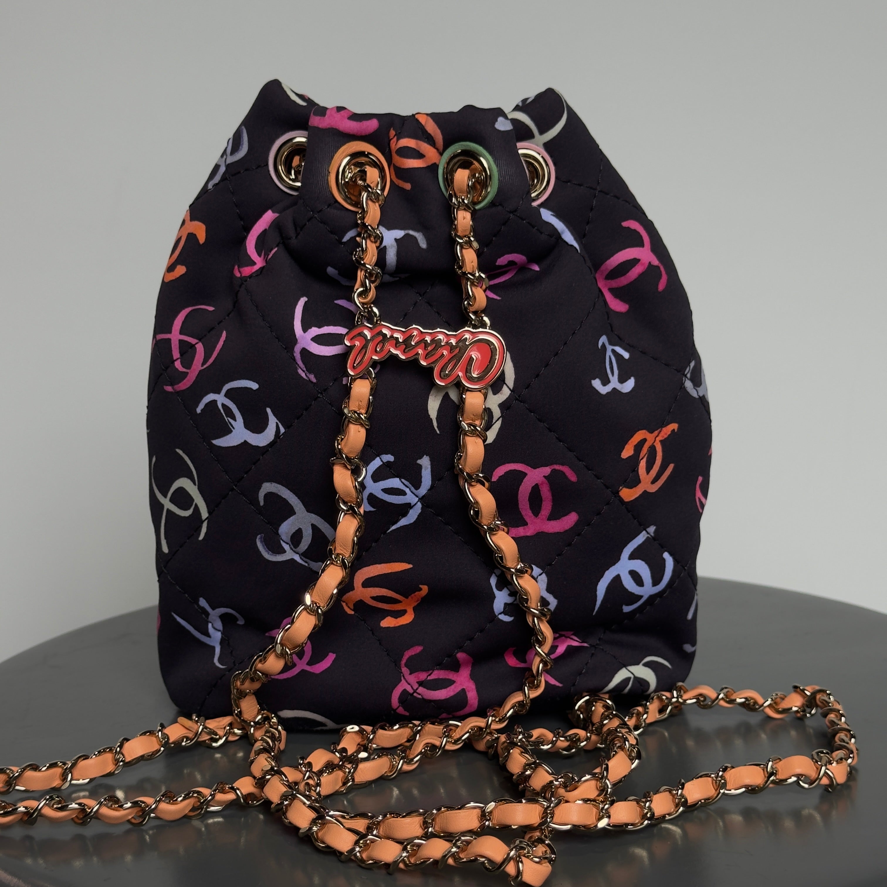Chanel Medium CC Drawstring Backpack Multicolored Printed Fabric Light Gold Hardware