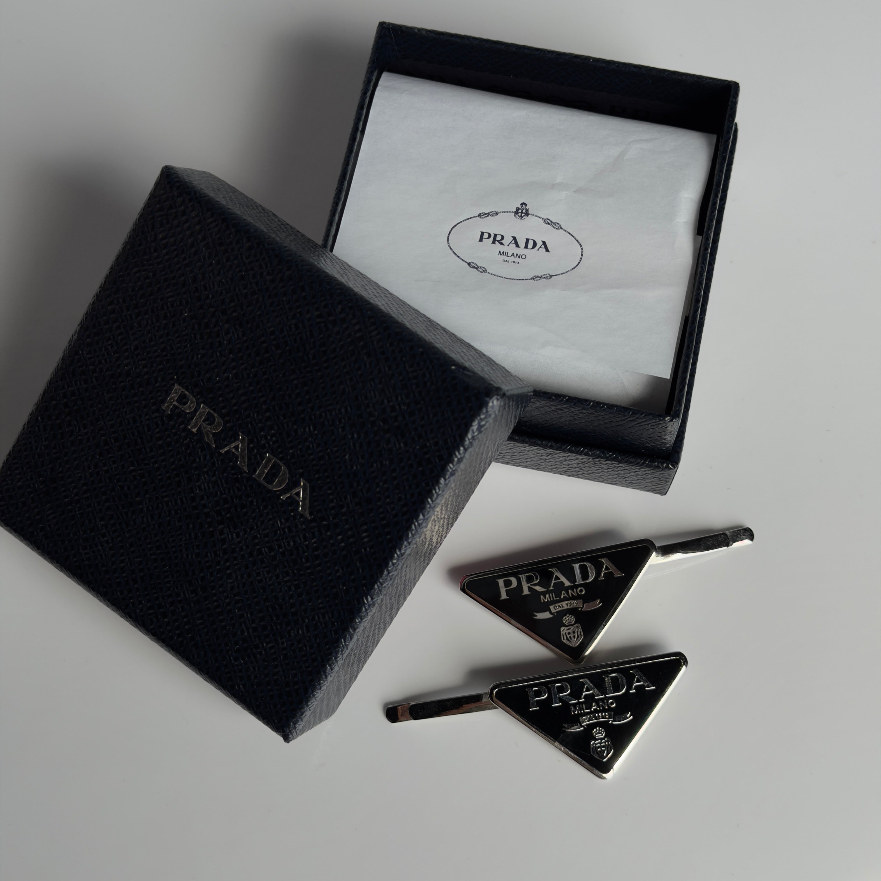 Prada Enamel Triangle Logo Hair Clips