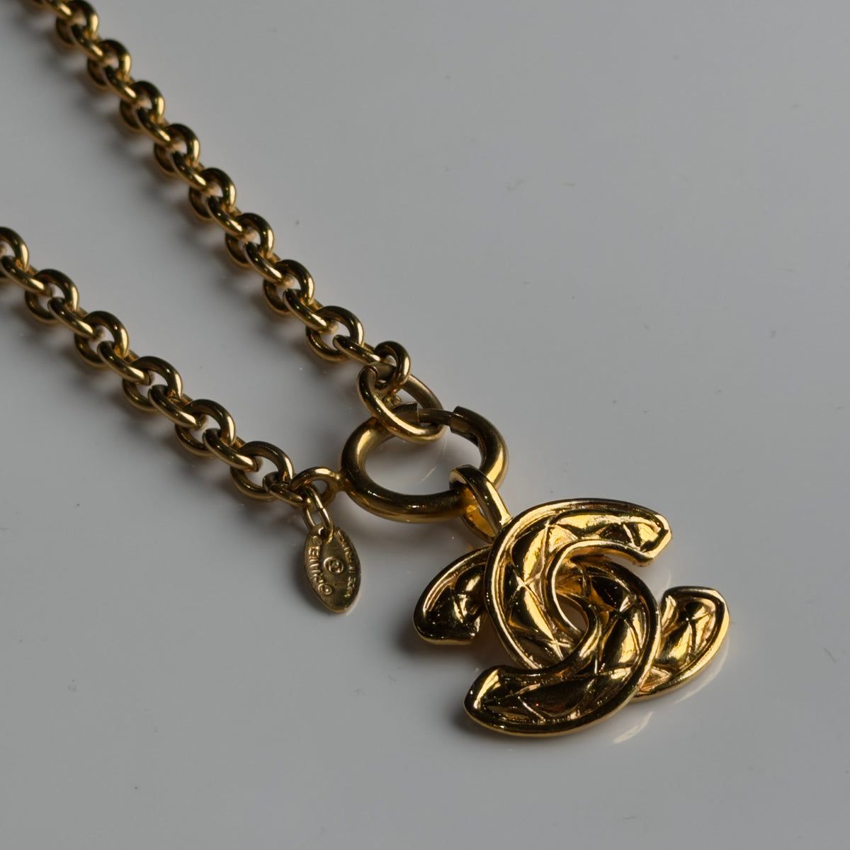 Vintage Chanel 1970-1980 Gold Plated Quilted CC Pendant Necklace