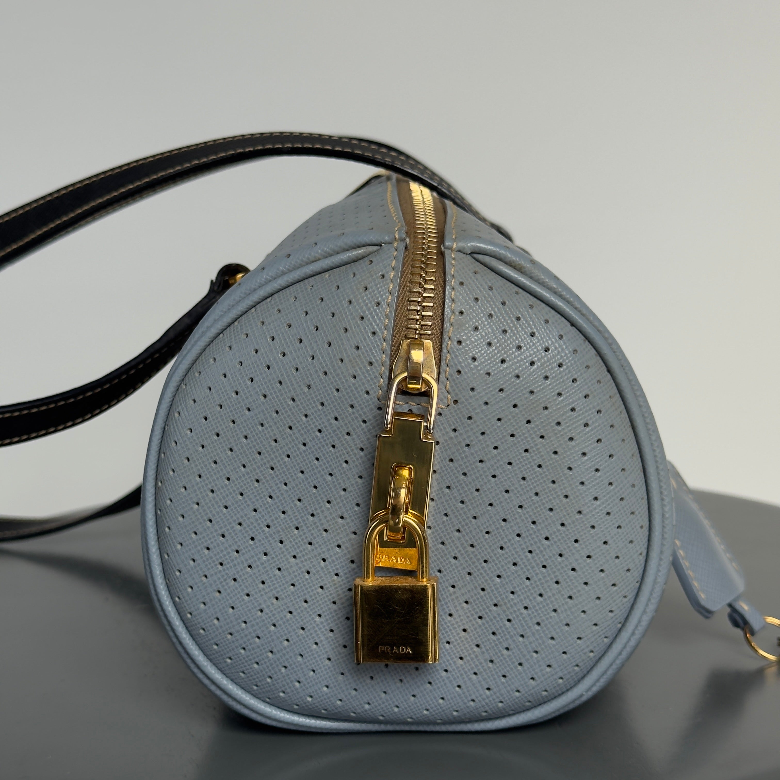 Prada Perforated Saffiano Lux Bauletto Bag Light Blue