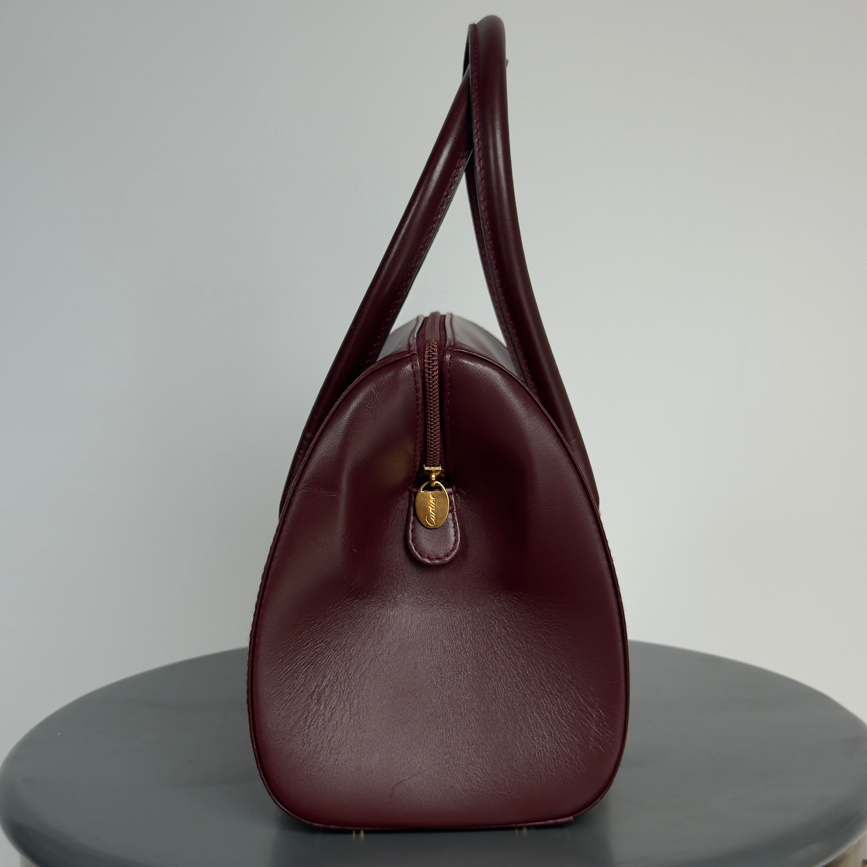 Cartier Must De Cartier Leather Bordeaux Boston Bag - Queen May