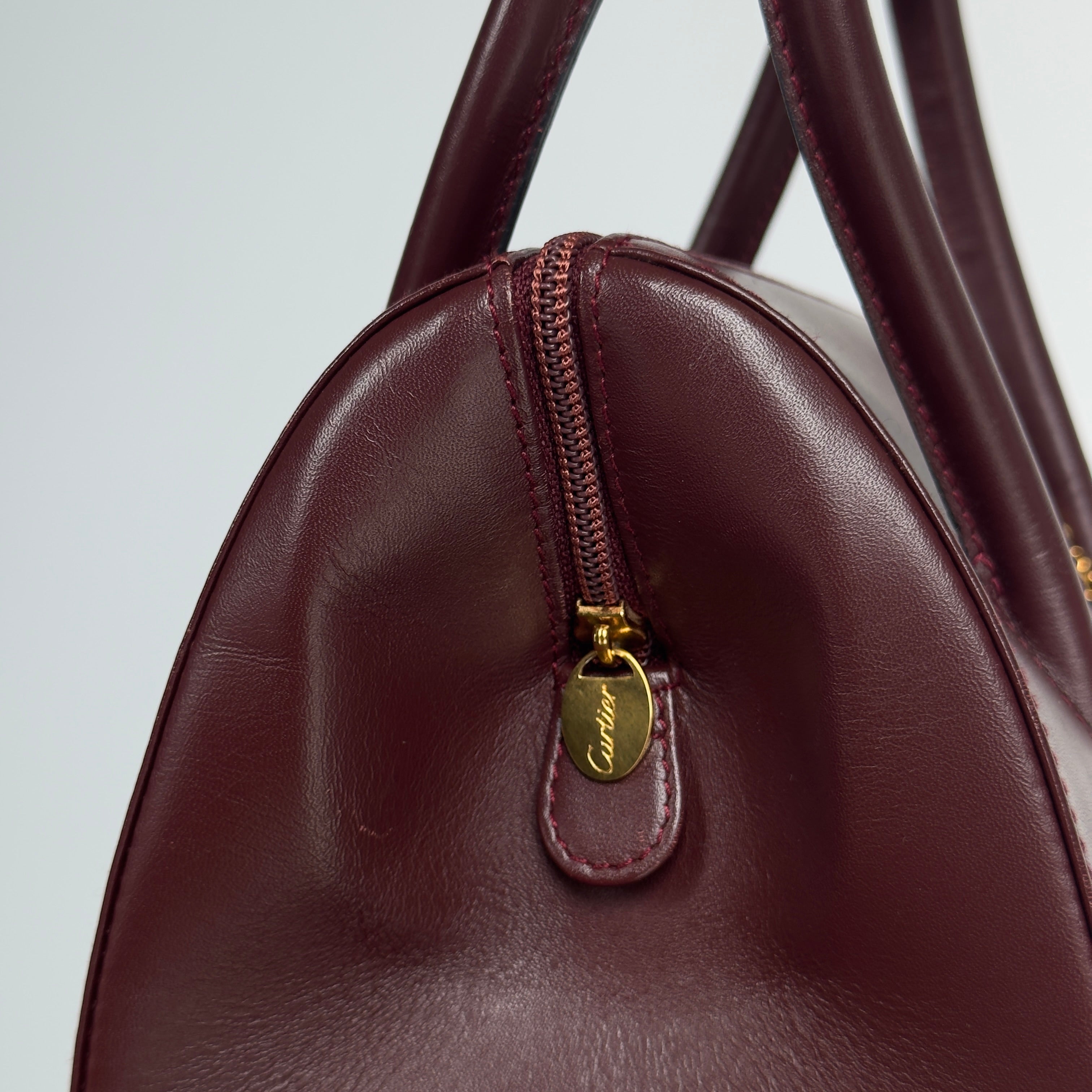 Cartier Must De Cartier Leather Bordeaux Boston Bag - Queen May