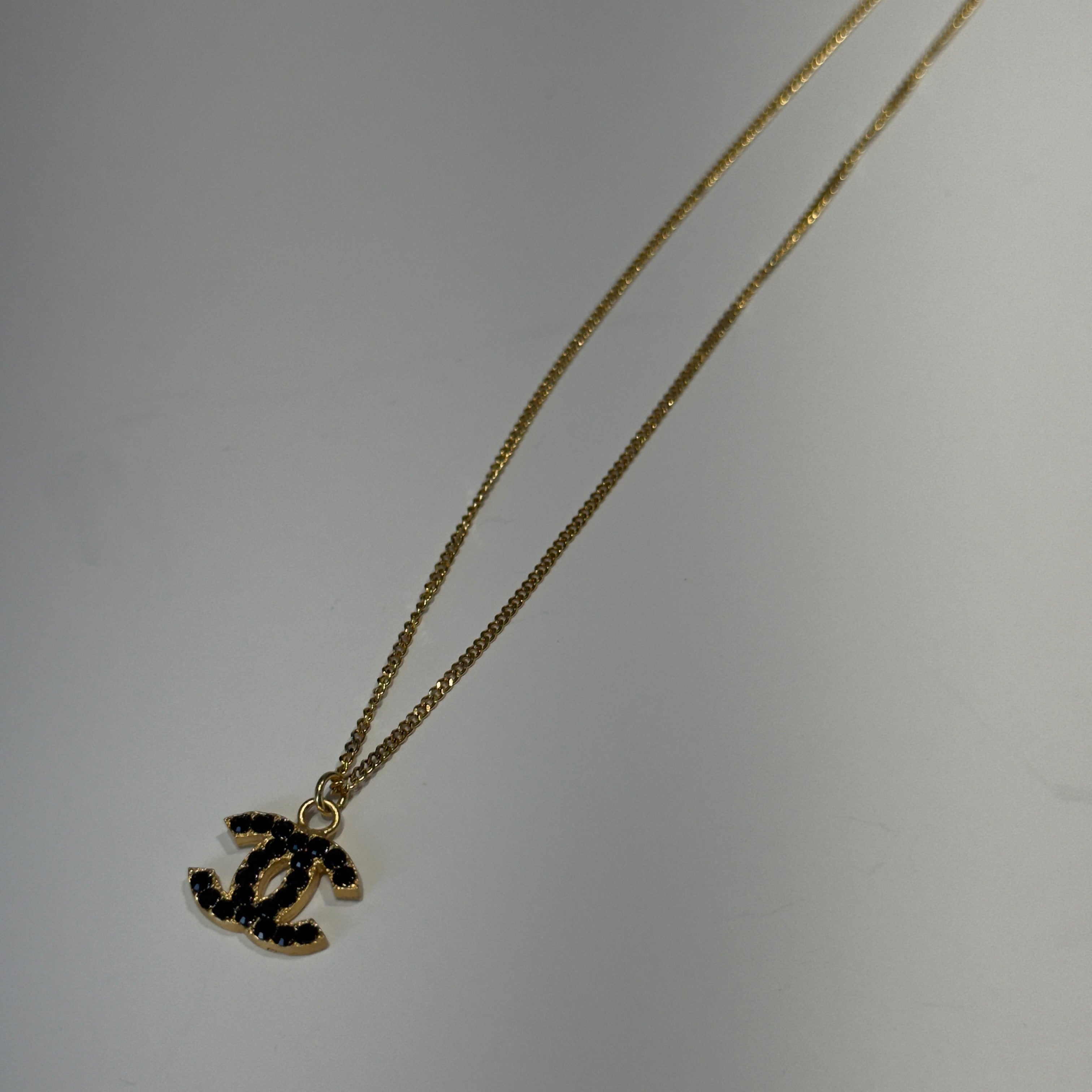 Chanel 2001 A Gold Tone Black Rhinestone CC Necklace - Queen May