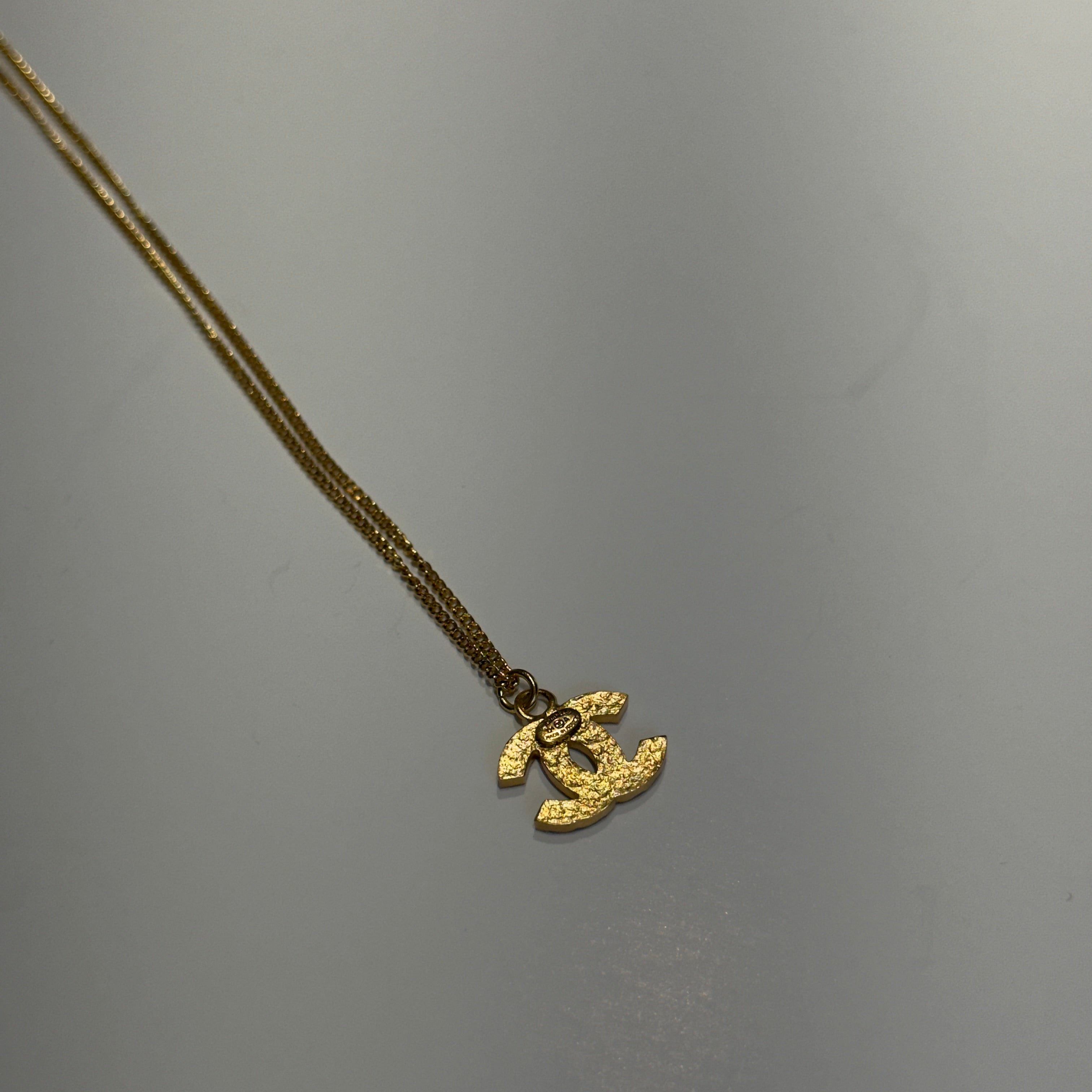 Chanel 2001 A Gold Tone Black Rhinestone CC Necklace - Queen May