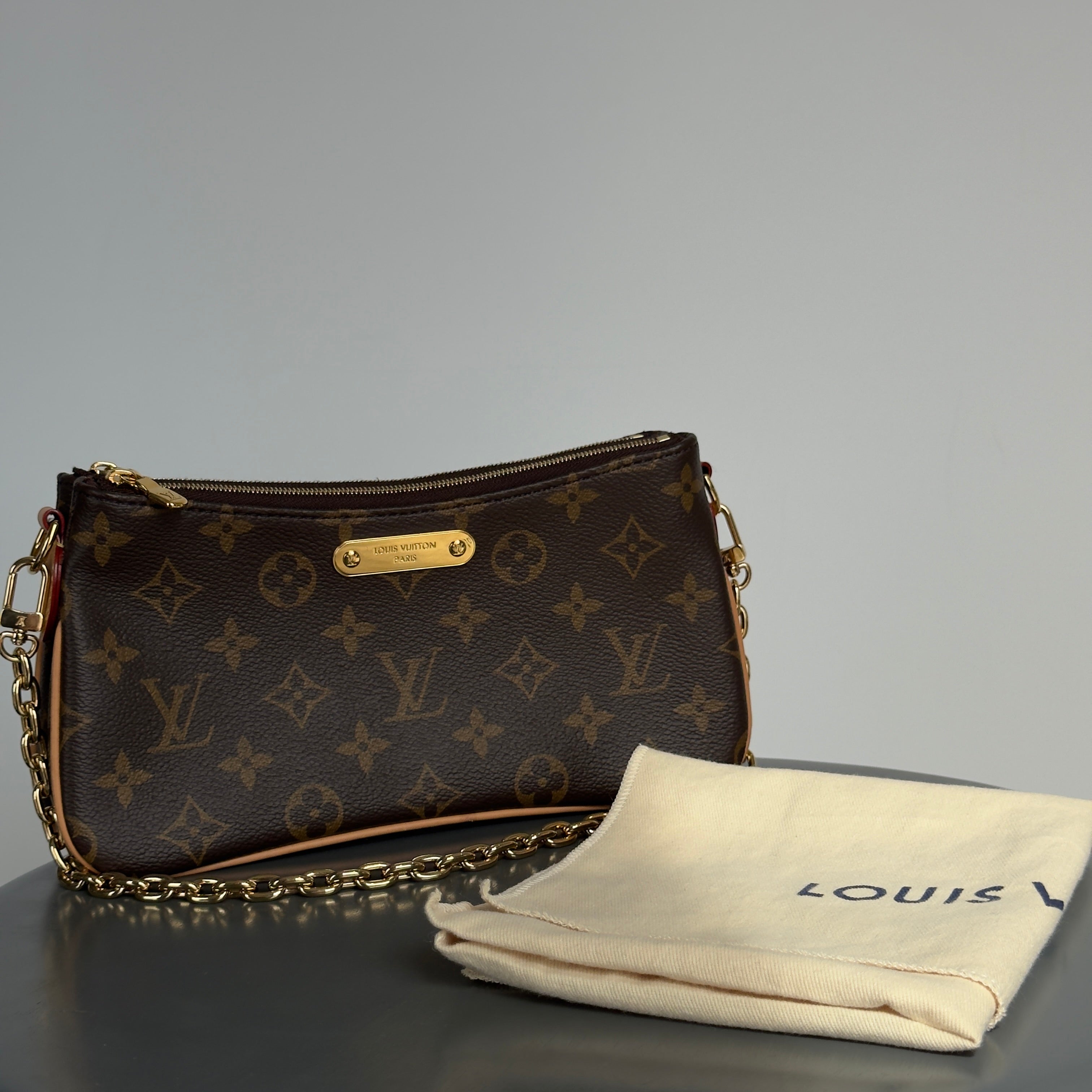 Louis Vuitton Liv Pochette - Queen May