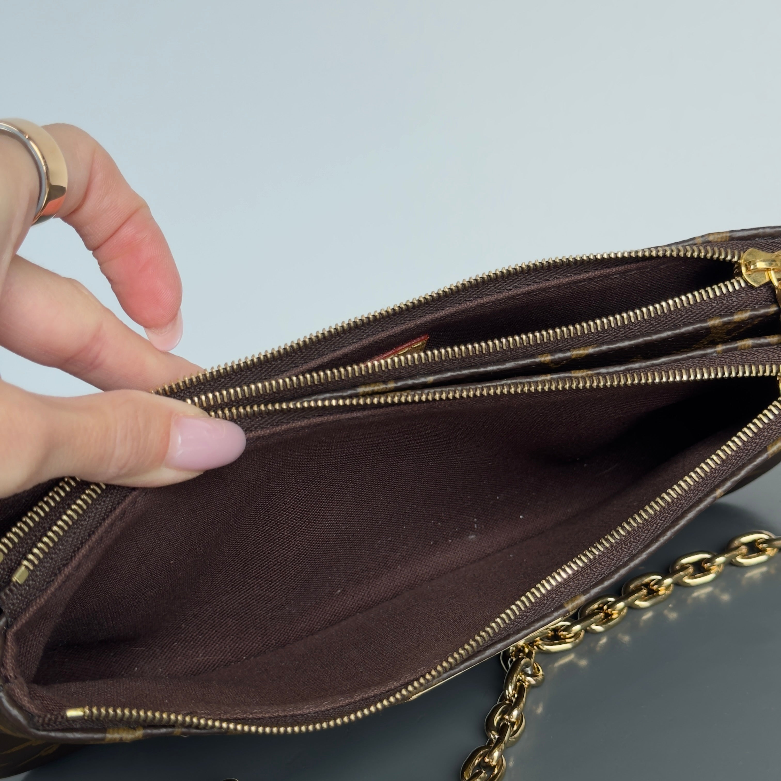 Louis Vuitton Liv Pochette - Queen May