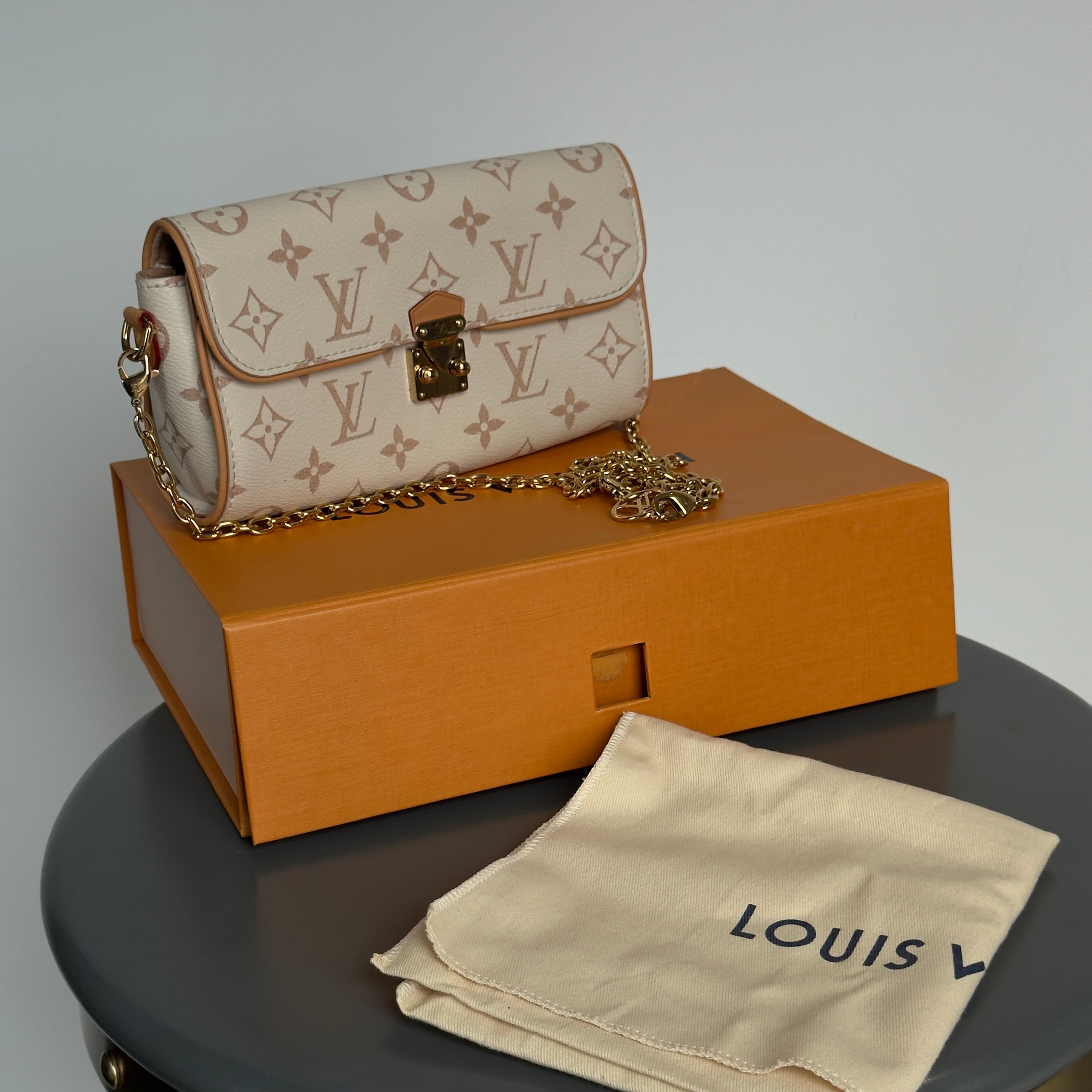 Louis Vuitton Camille Pochette In Dune - Queen May