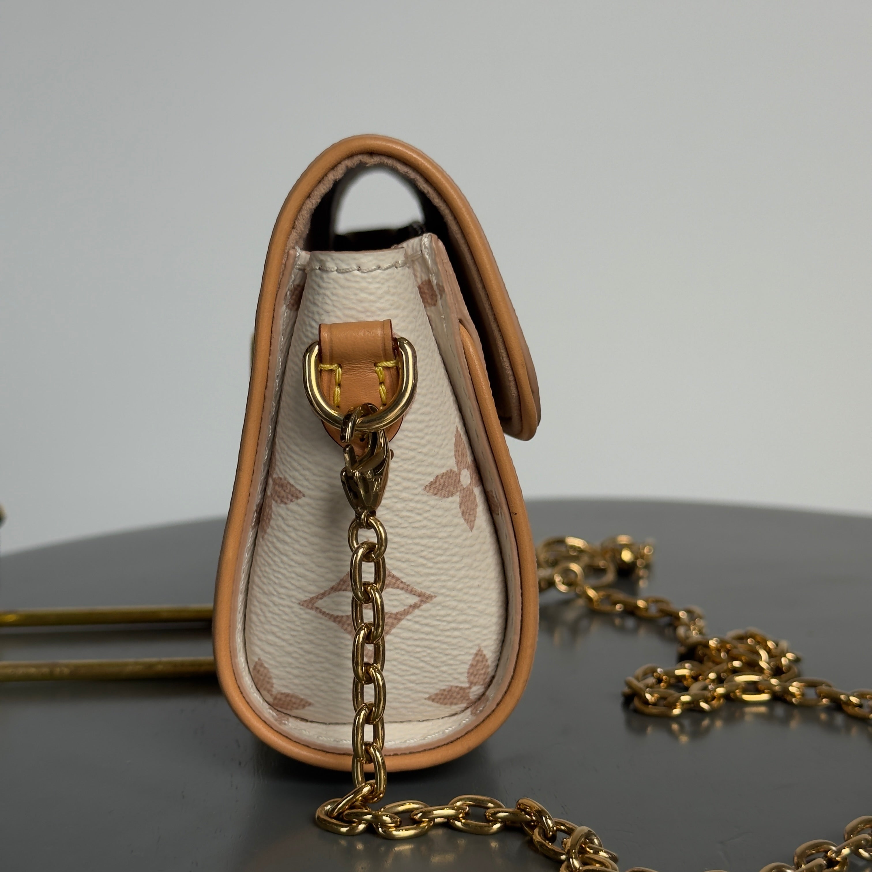 Louis Vuitton Camille Pochette In Dune - Queen May