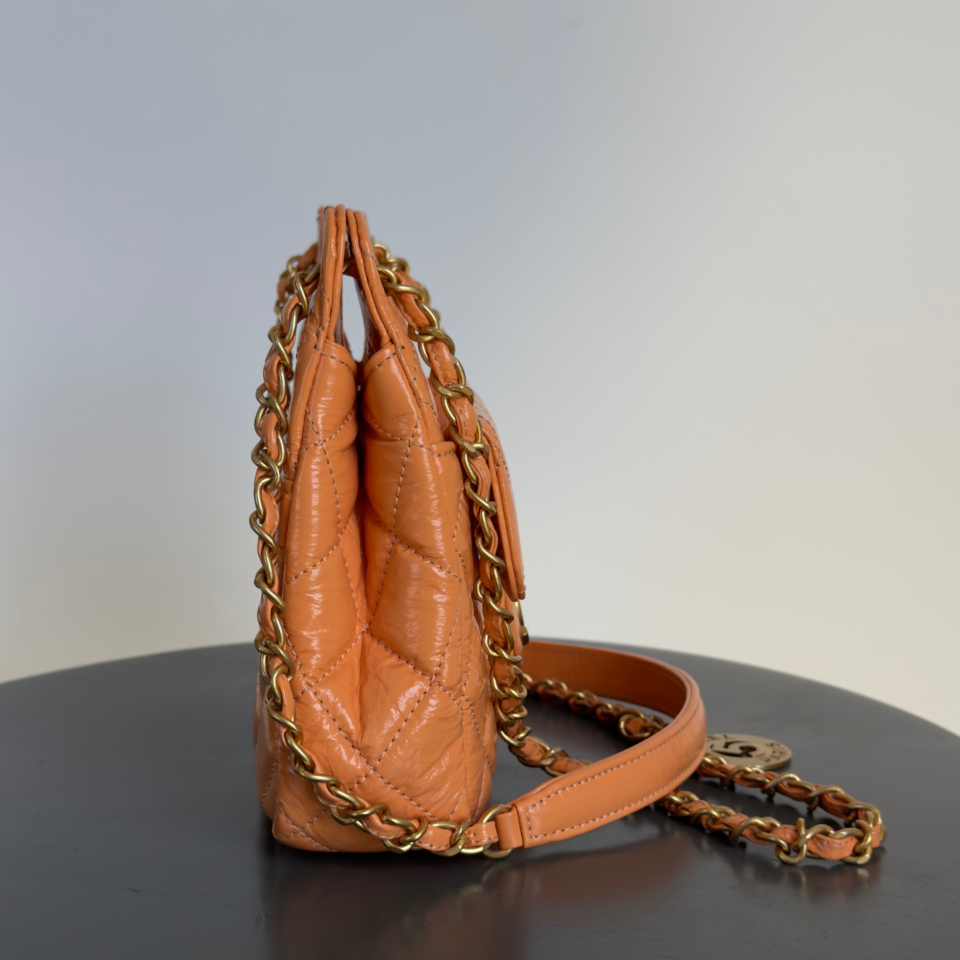 Chanel Orange Shiny Crumpled Quilted Leather Small Wavy CC Hobo 2023 - Queen May
