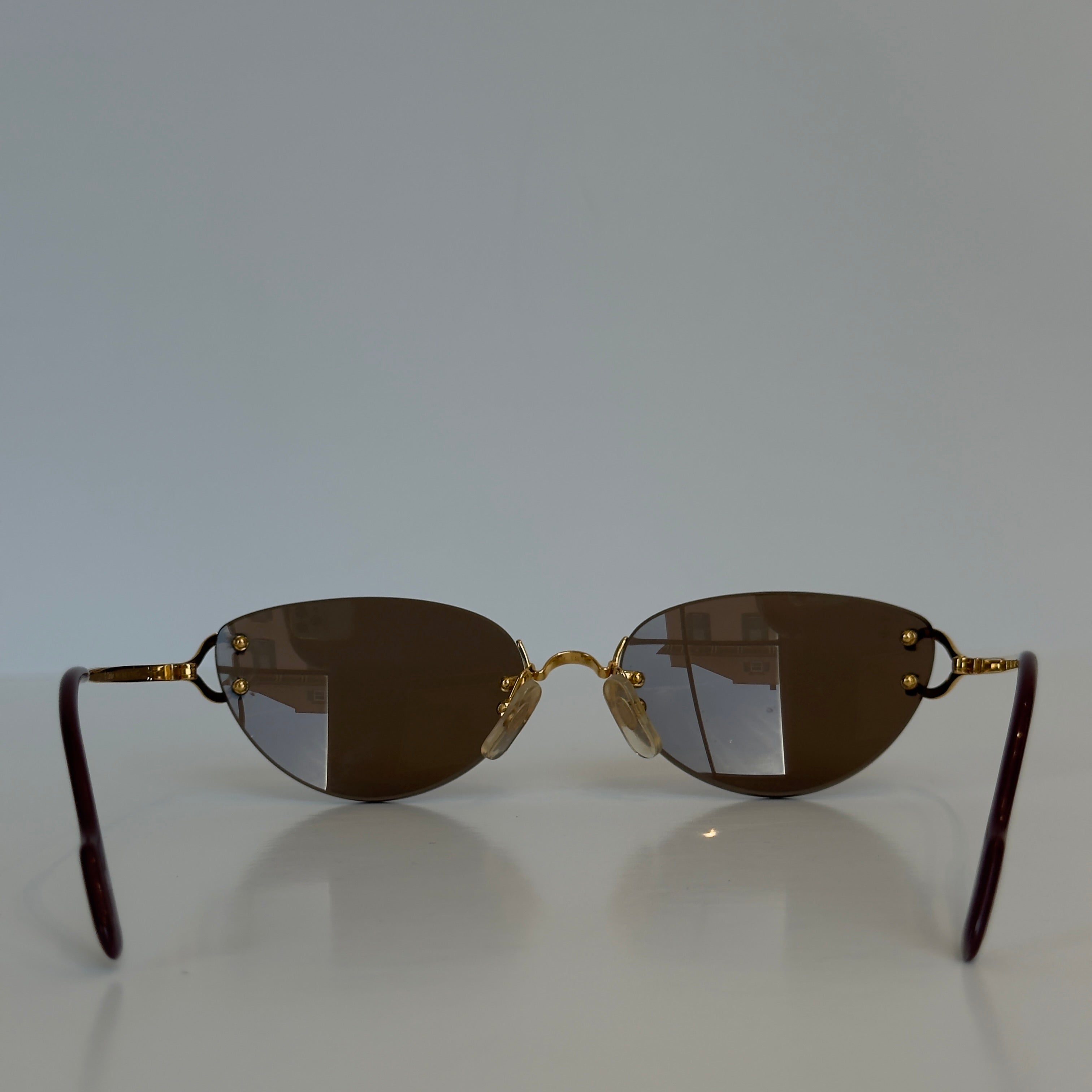 Cartier Oval Rimless Sunglasses Brown - Queen May