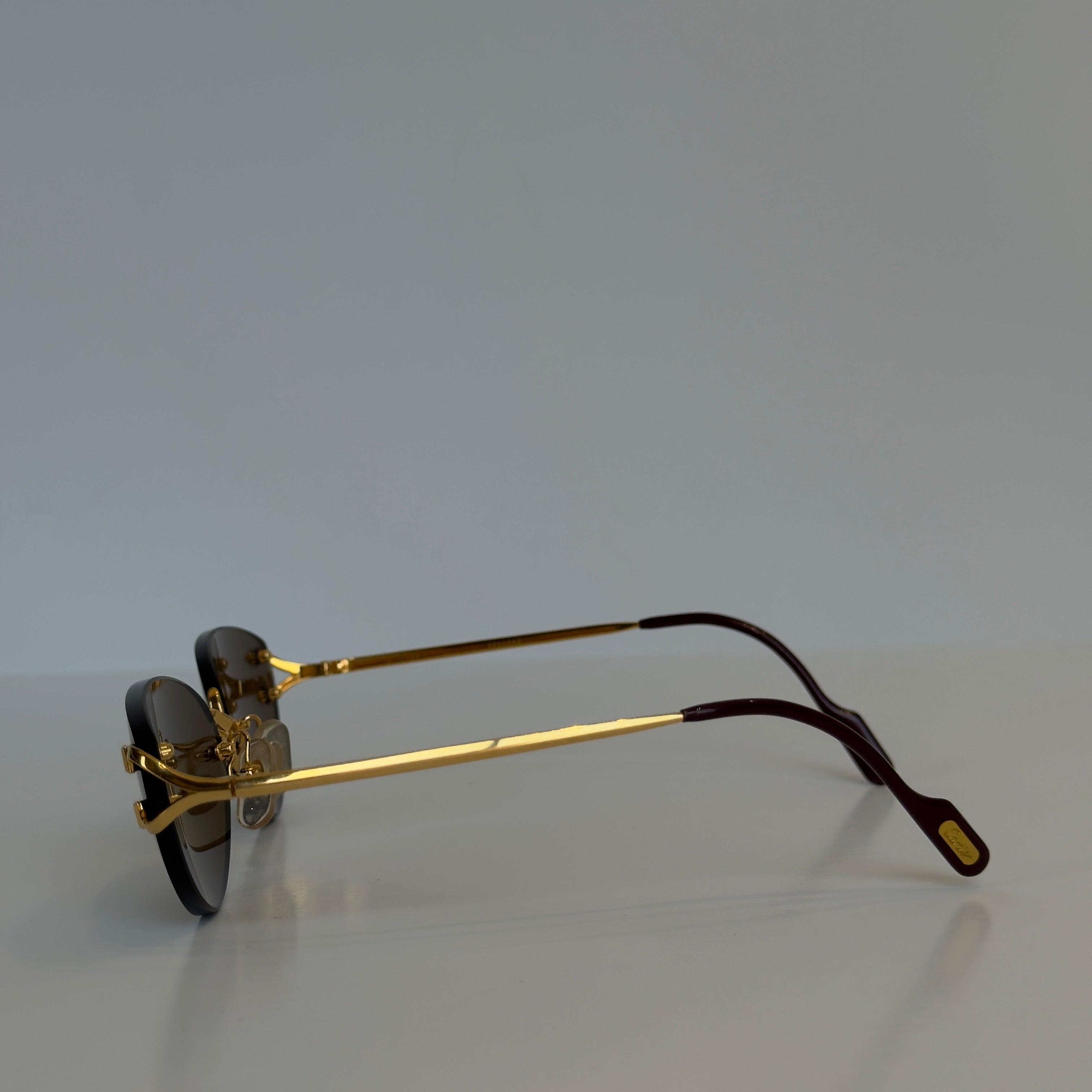 Cartier Oval Rimless Sunglasses Brown - Queen May