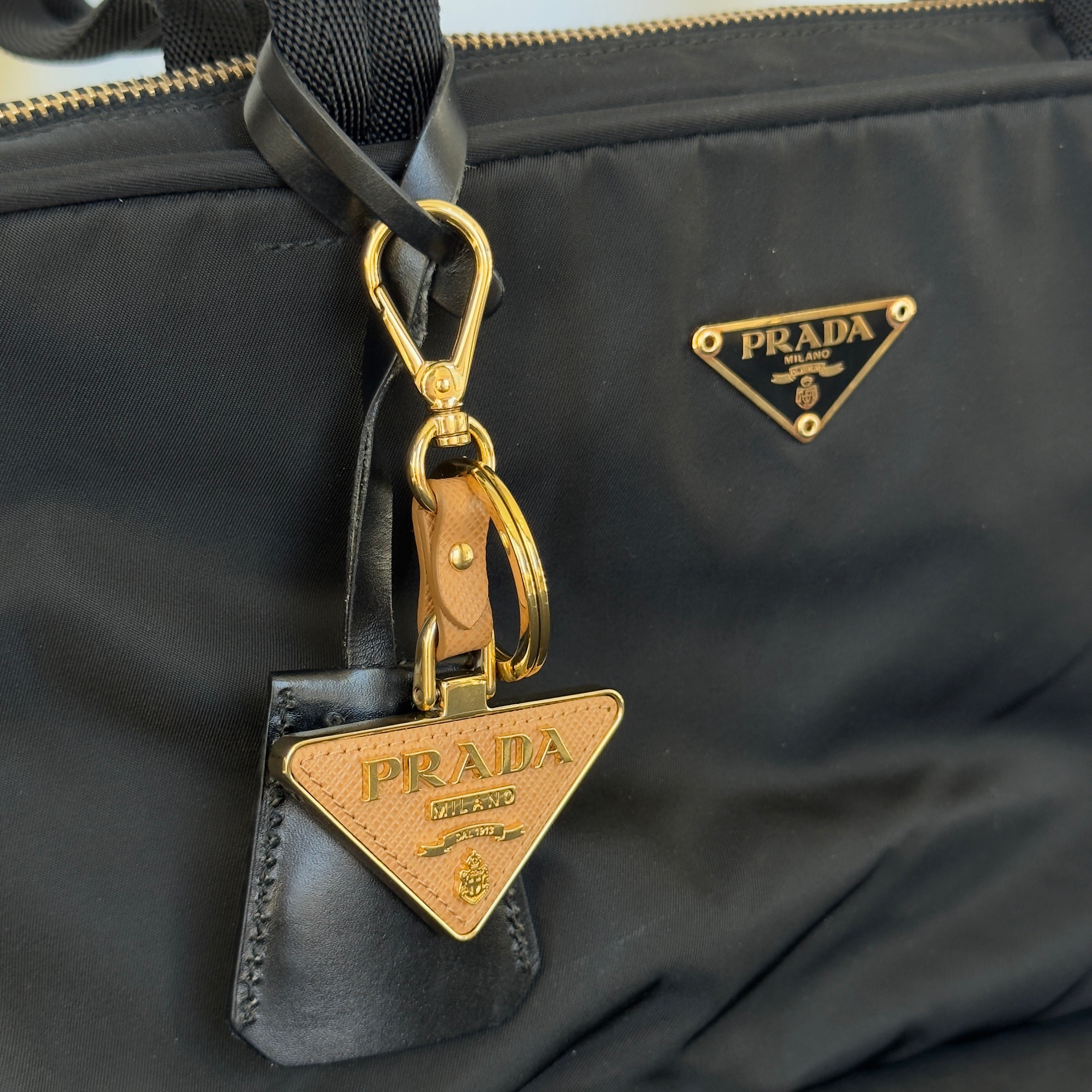 Prada Saffiano Leather Taupe Triangle Key Ring - Queen May