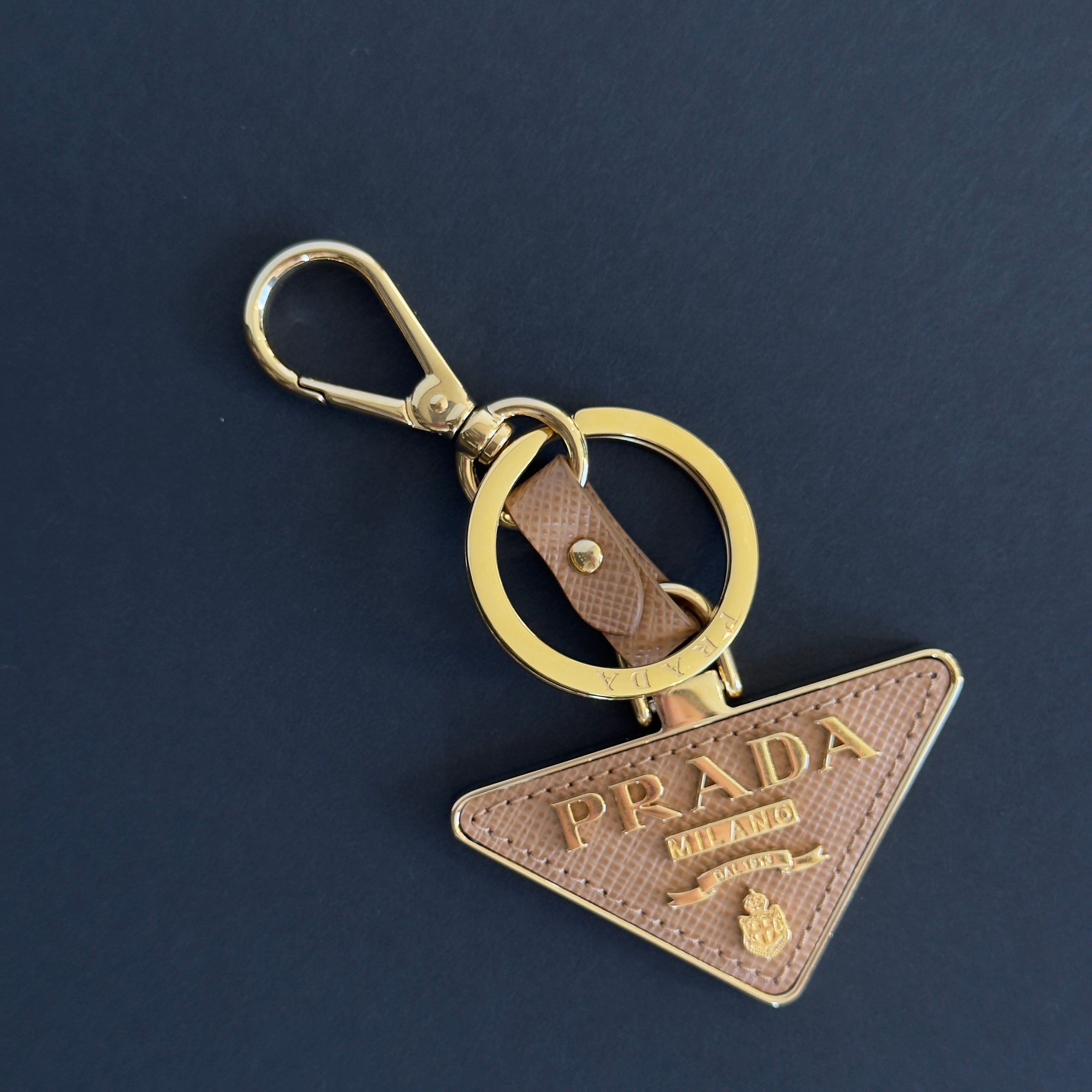 Prada Saffiano Leather Taupe Triangle Key Ring - Queen May