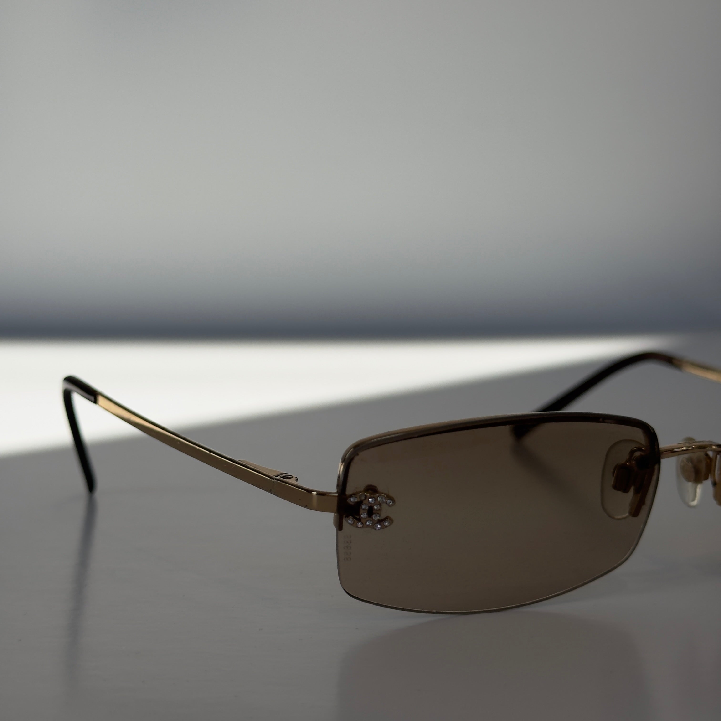 Vintage Chanel 4093-B Rimless Wire Frame Rhinestone CC Sunglasses Smoke - Queen May
