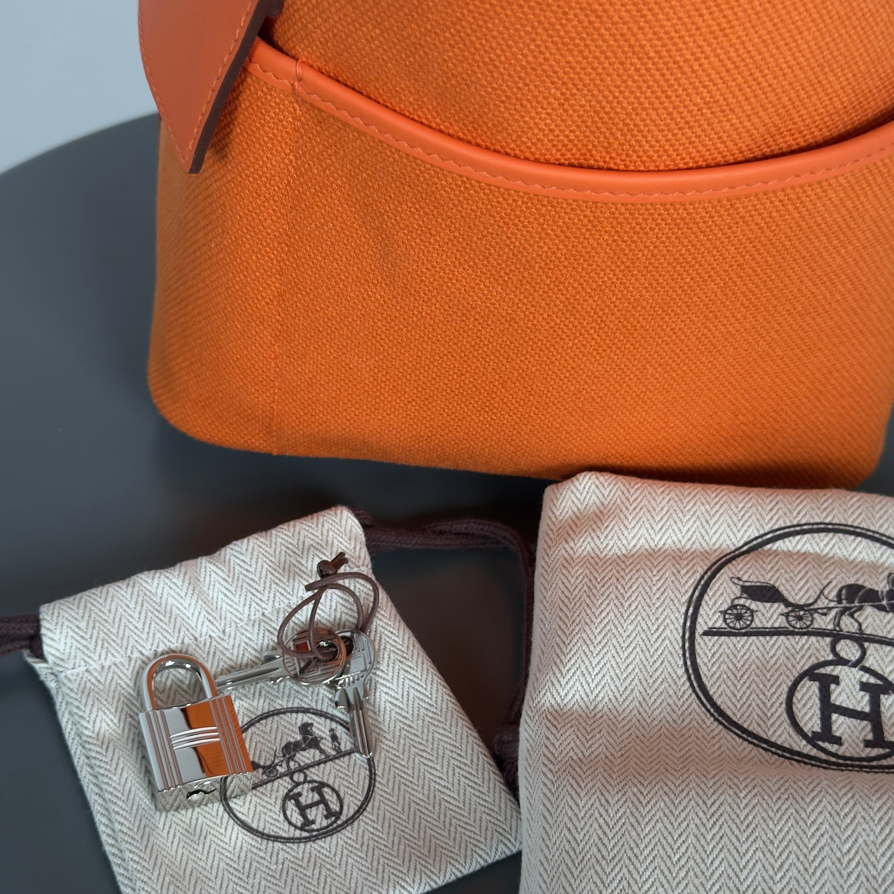 Hermes Orange Swift + Toile Goeland Cargo Picotin Lock 18 Palladium Hardware With Twilly - Queen May