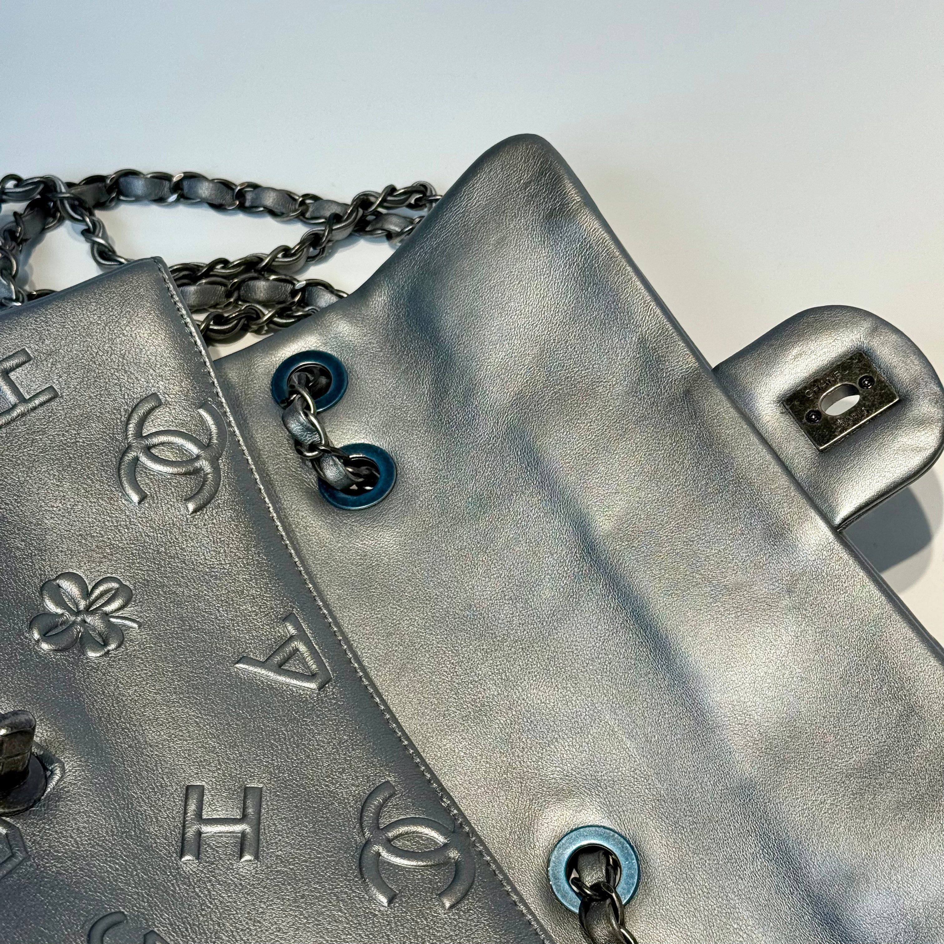 Chanel Silver Leather Medium Precious Symbols Bag - Queen May