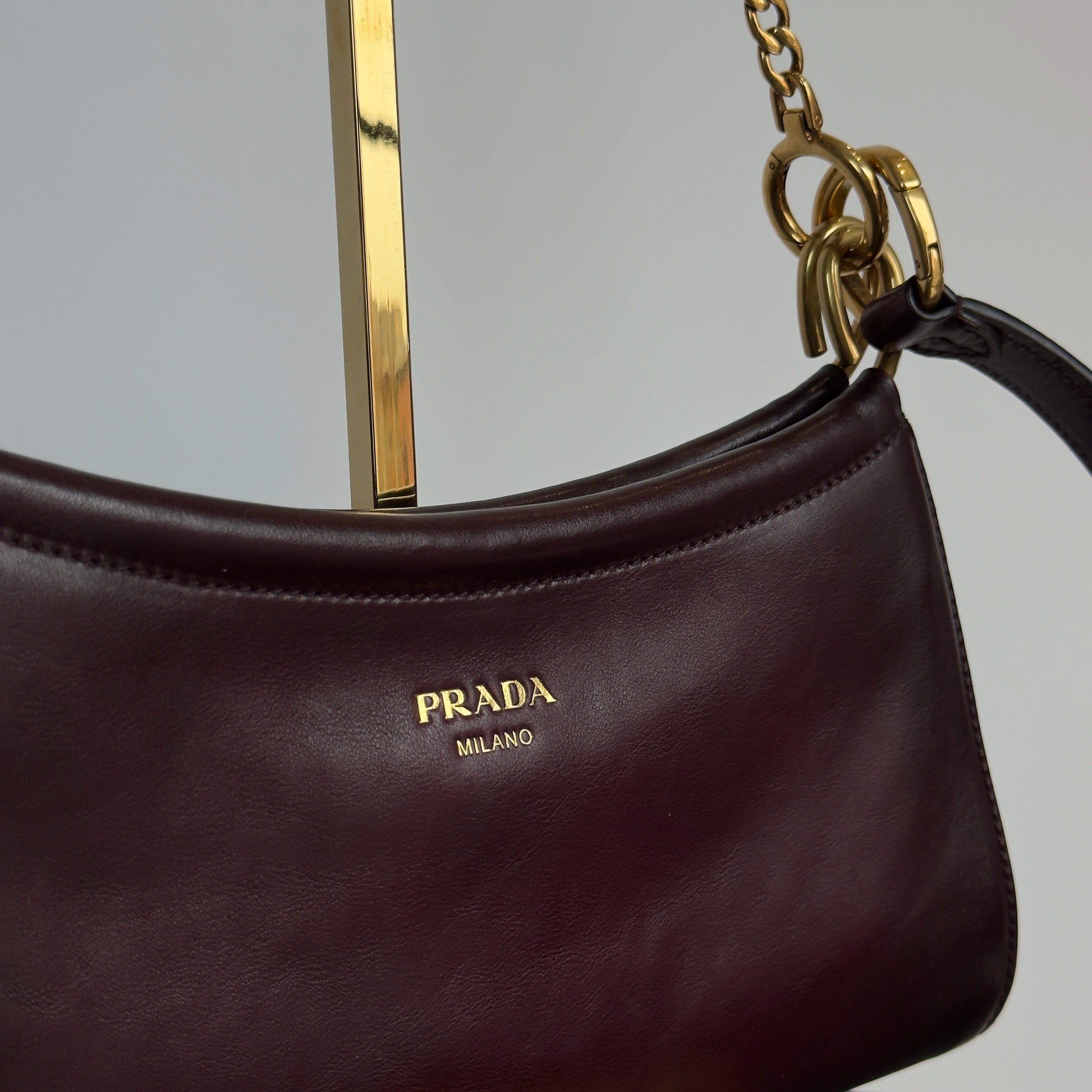 Ultra Rare Prada Fall 2025 Slouchy Burgundy Half Moon Shoulder Bag - Queen May