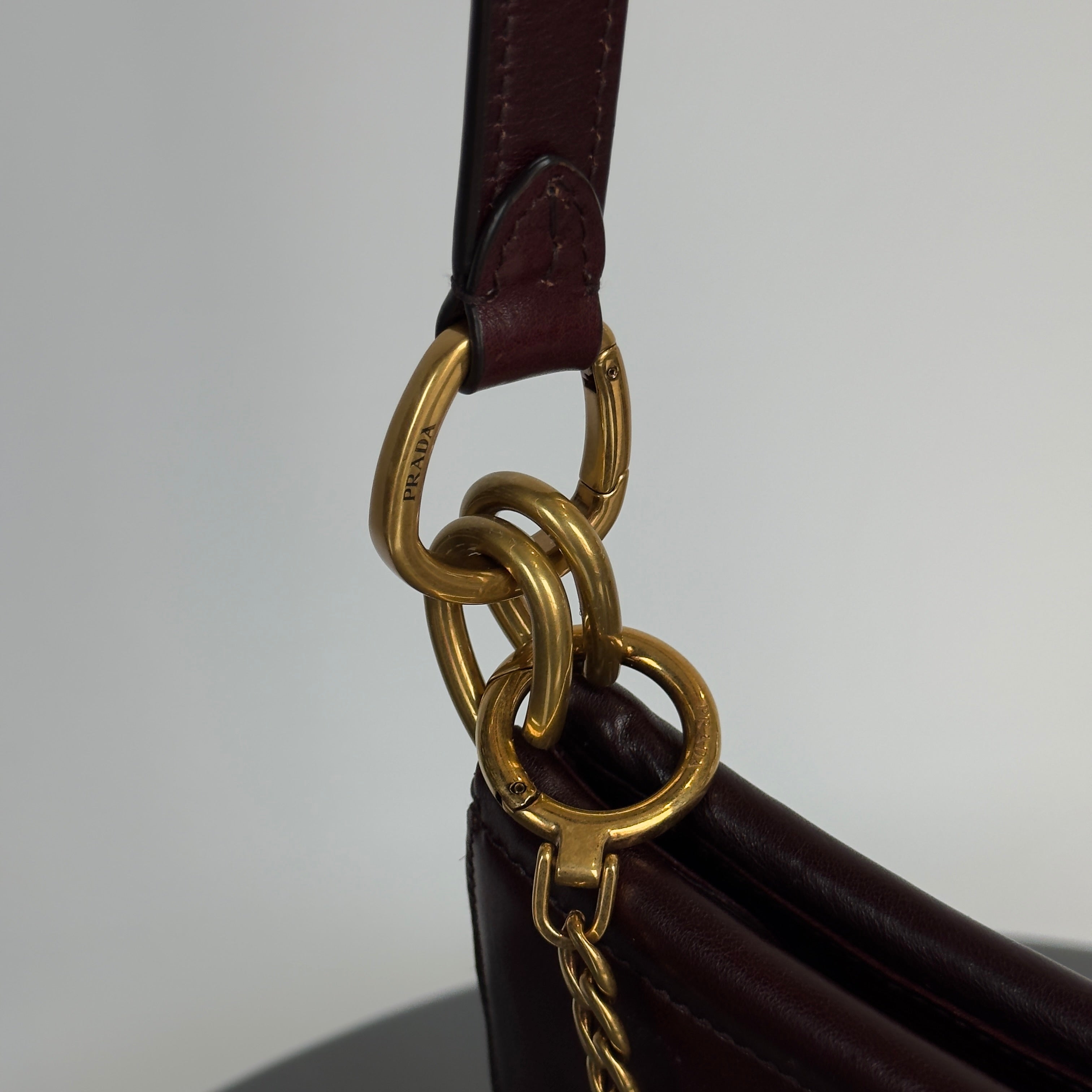 Ultra Rare Prada Fall 2025 Slouchy Burgundy Half Moon Shoulder Bag - Queen May