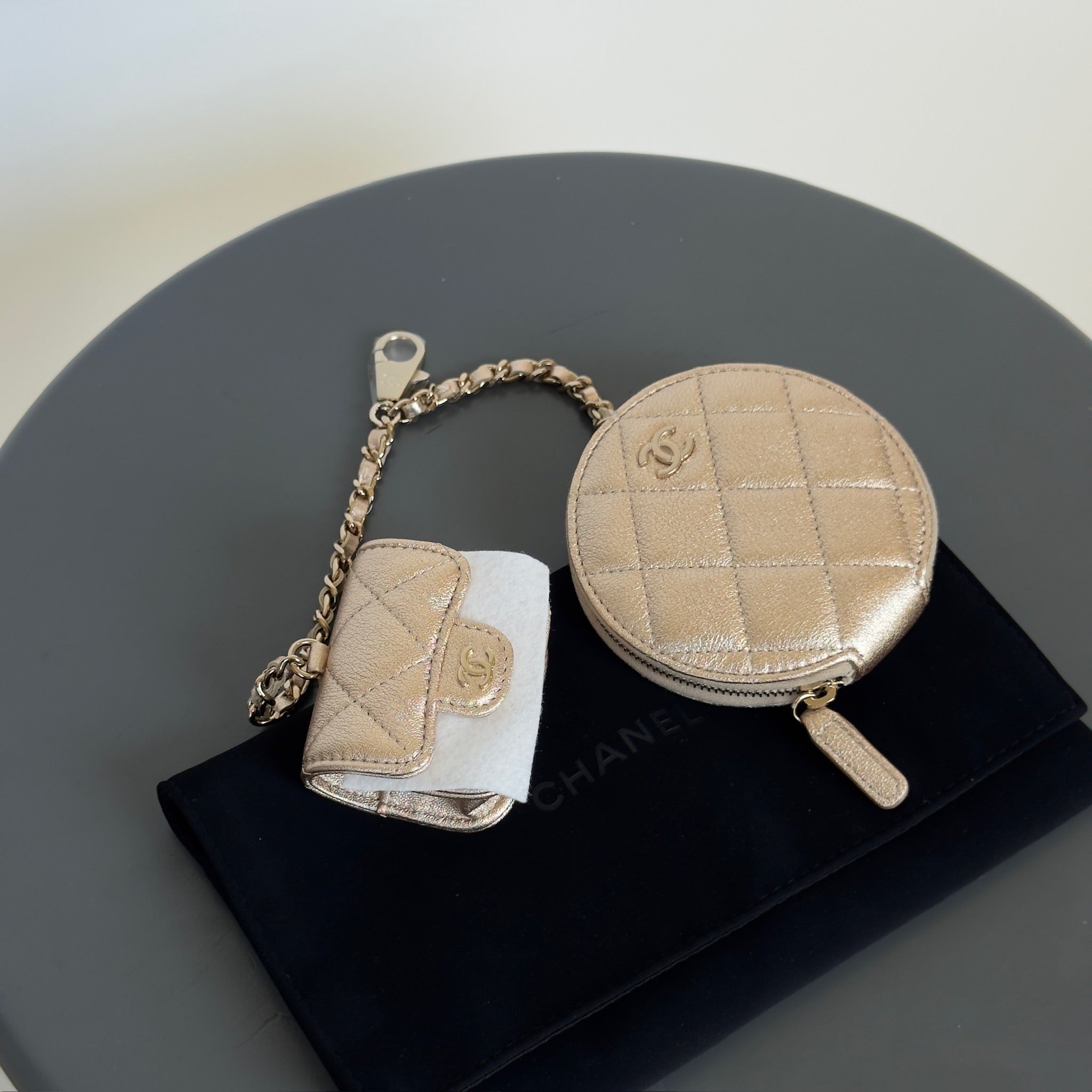 Chanel Metallic Lambskin Quilted Round Clip On Coin Purse Airpods Case - Queen May