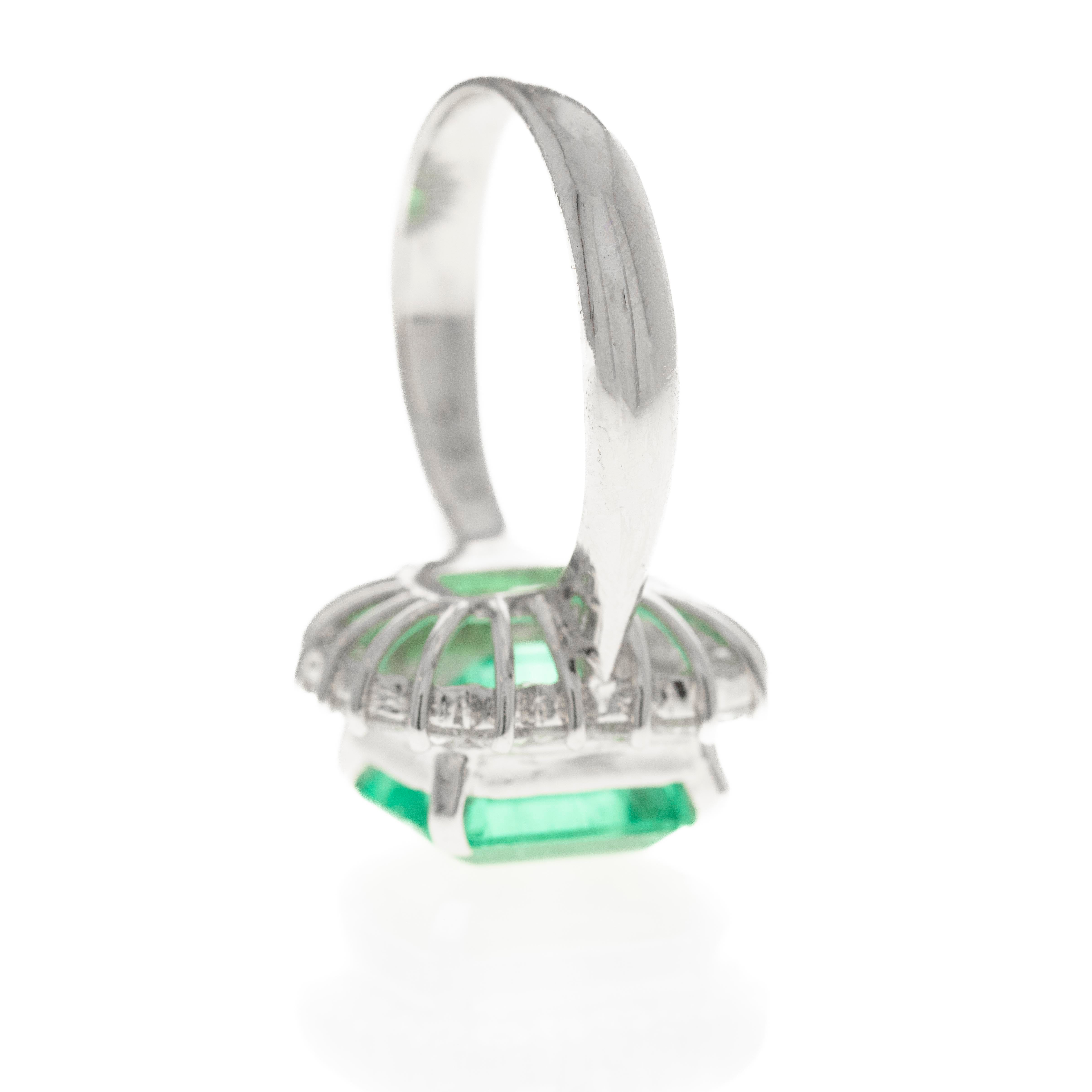 Platinum 3.74 Carat Columbian Emerald Diamond Halo Ring