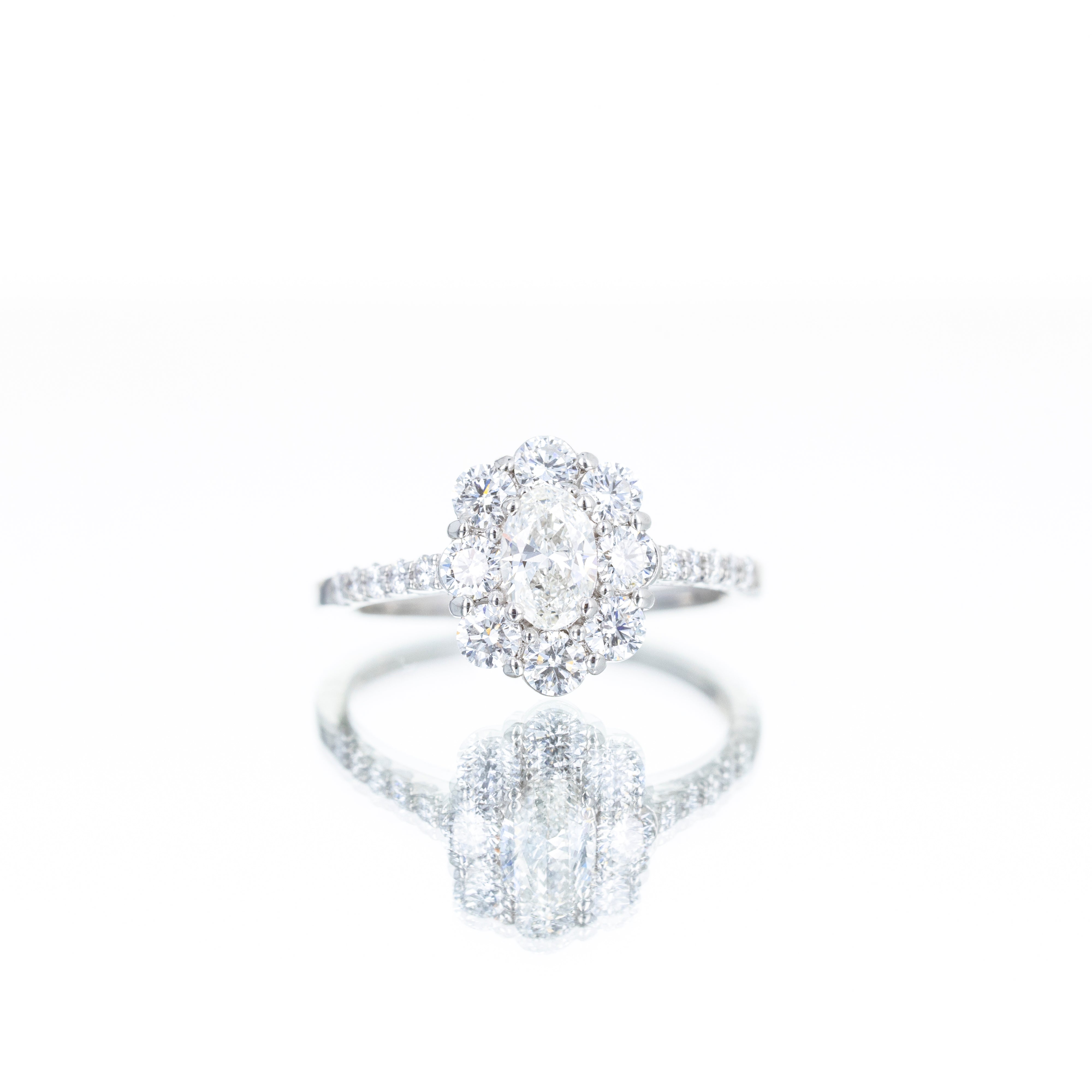 Platinum 0.33 Carat Oval Diamond Halo Engagement Ring - Queen May
