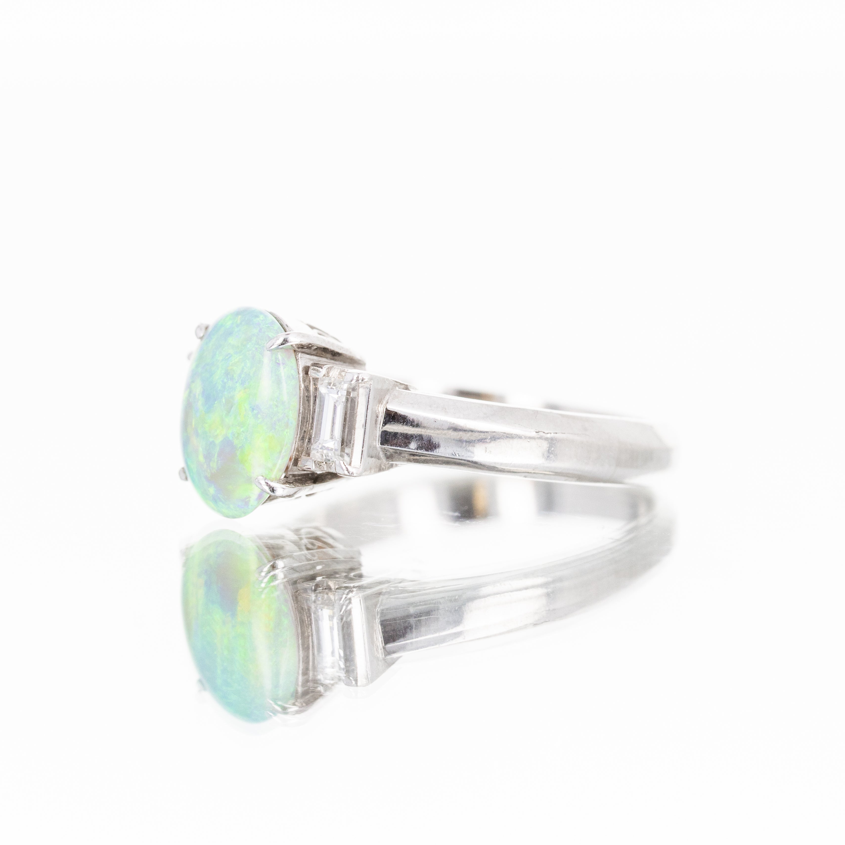 Platinum 1.38 Carat Oval Opal Diamond Baguette Ring - Queen May