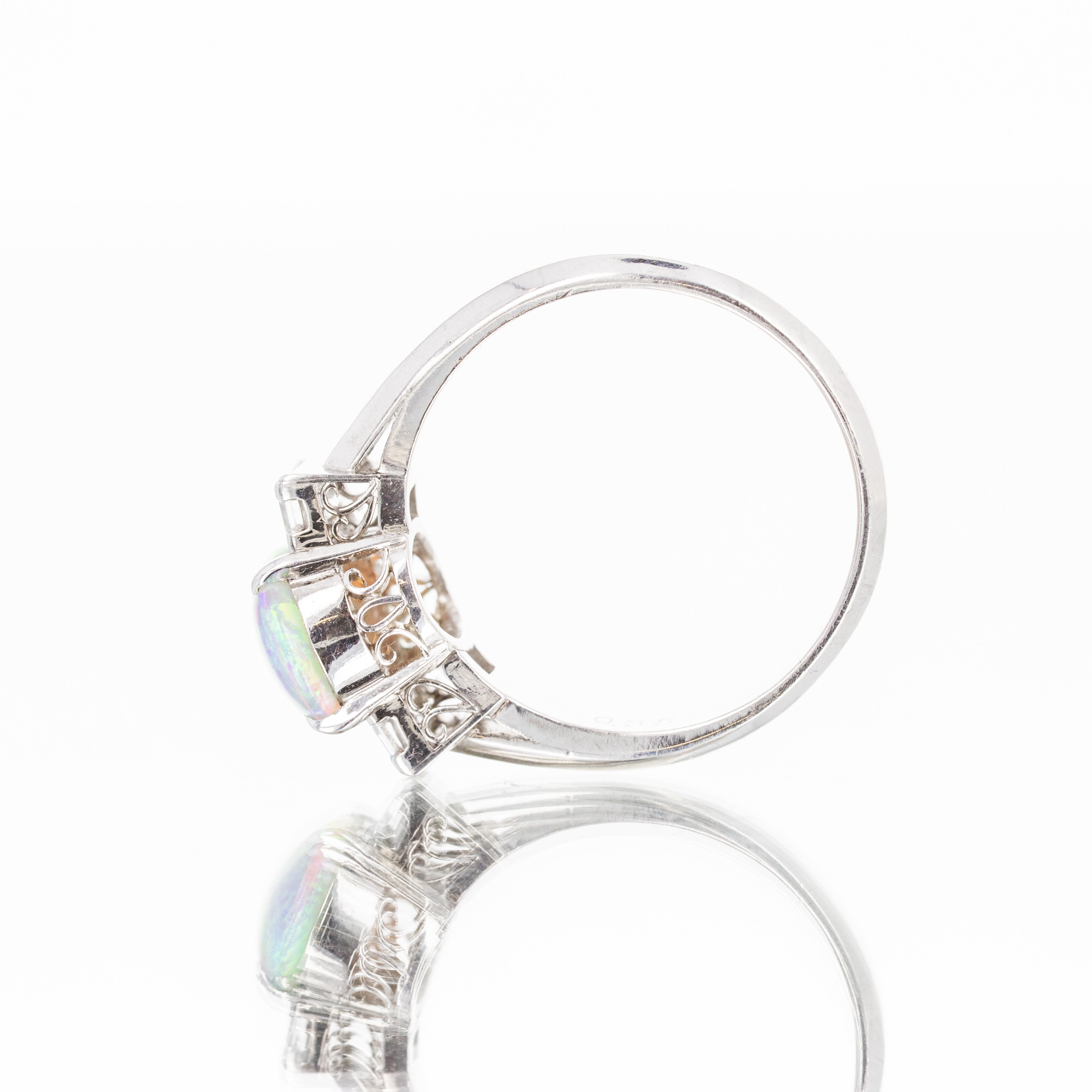 Platinum 1.38 Carat Oval Opal Diamond Baguette Ring - Queen May