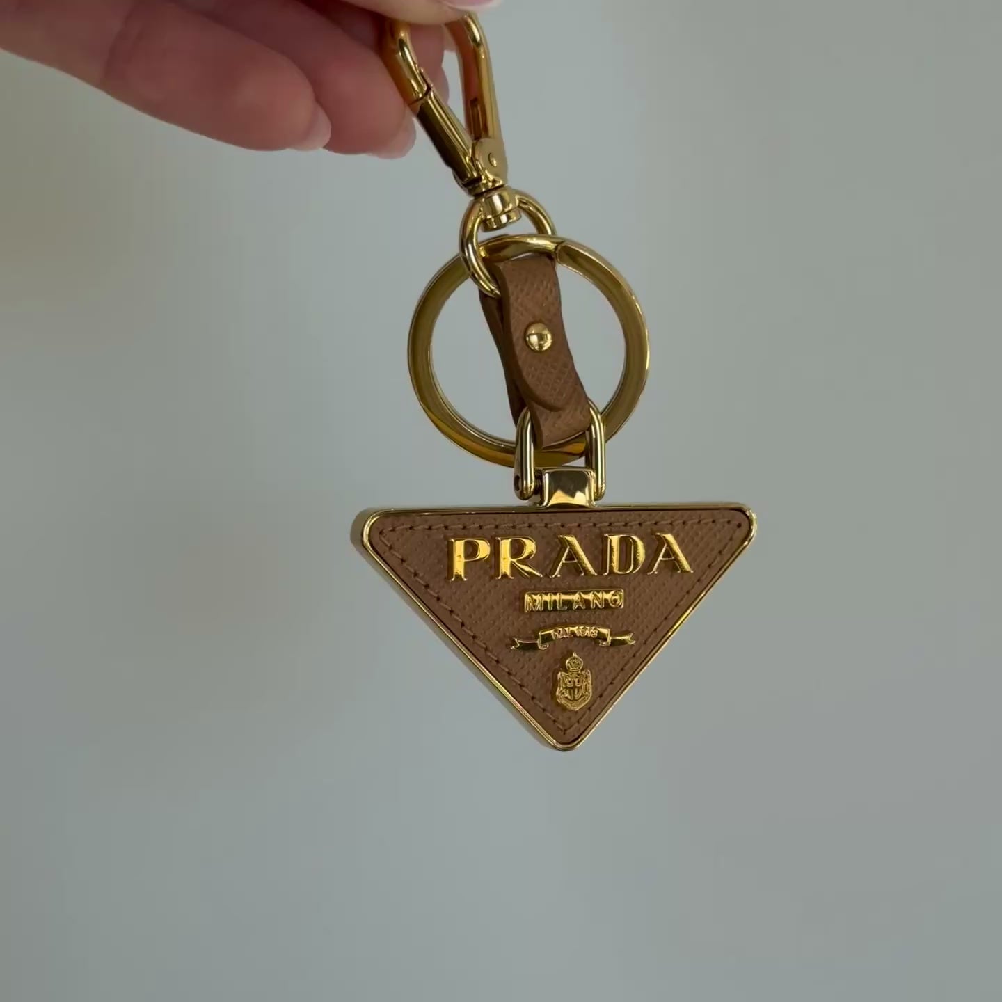 Prada Saffiano Leather Taupe Triangle Key Ring - Queen May