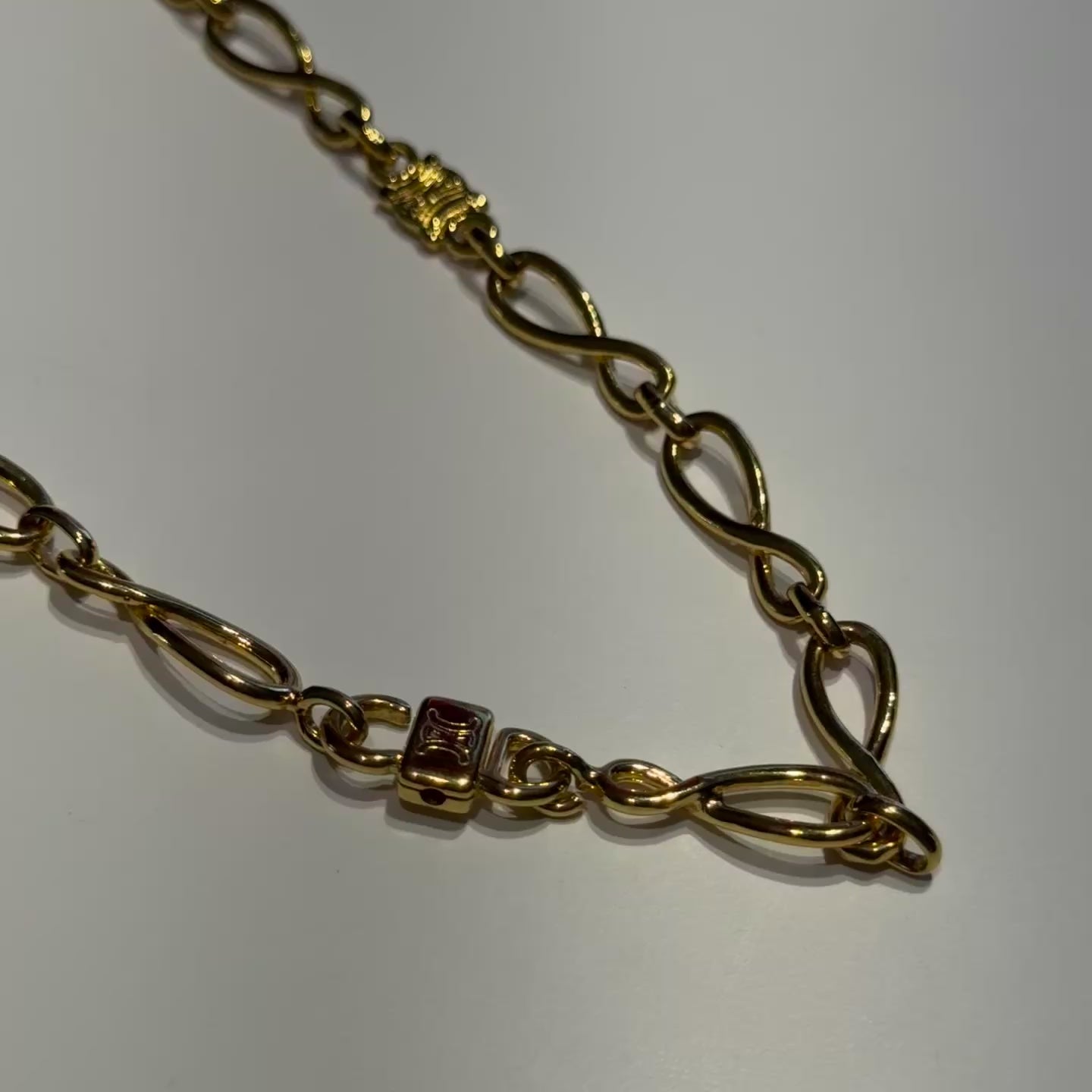 Celine Triomphe Infinity Necklace - Queen May