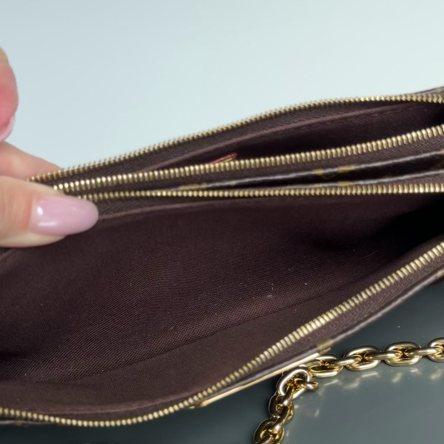 Louis Vuitton Liv Pochette - Queen May