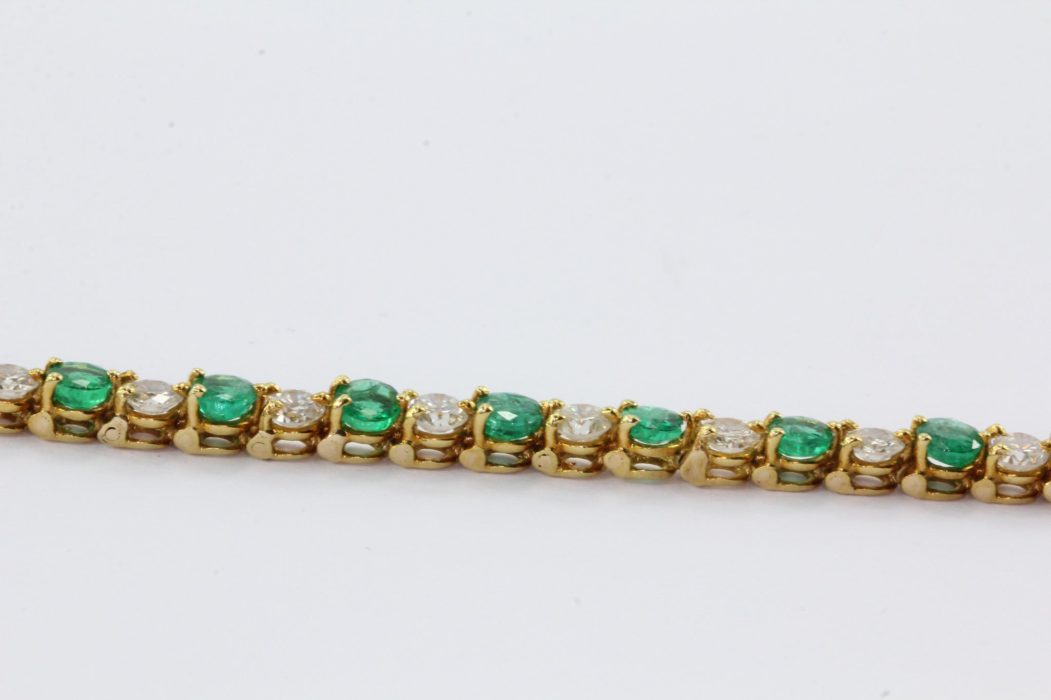 18K Gold Emerald Diamond Tennis Bracelet 7.25 Carats Total - Queen May