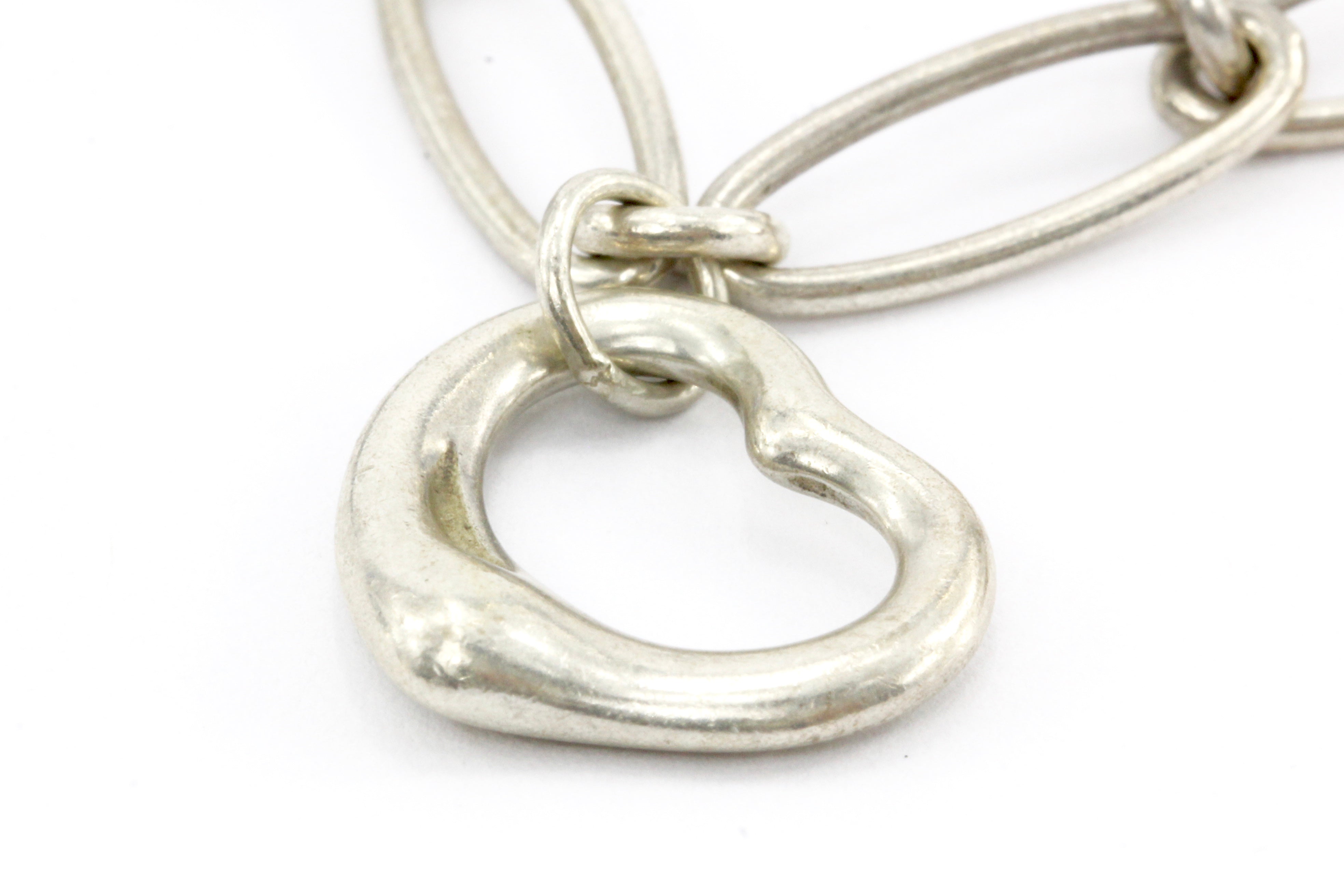 Tiffany & Co. Sterling Silver Multistage Five Charm Bracelet - Queen May