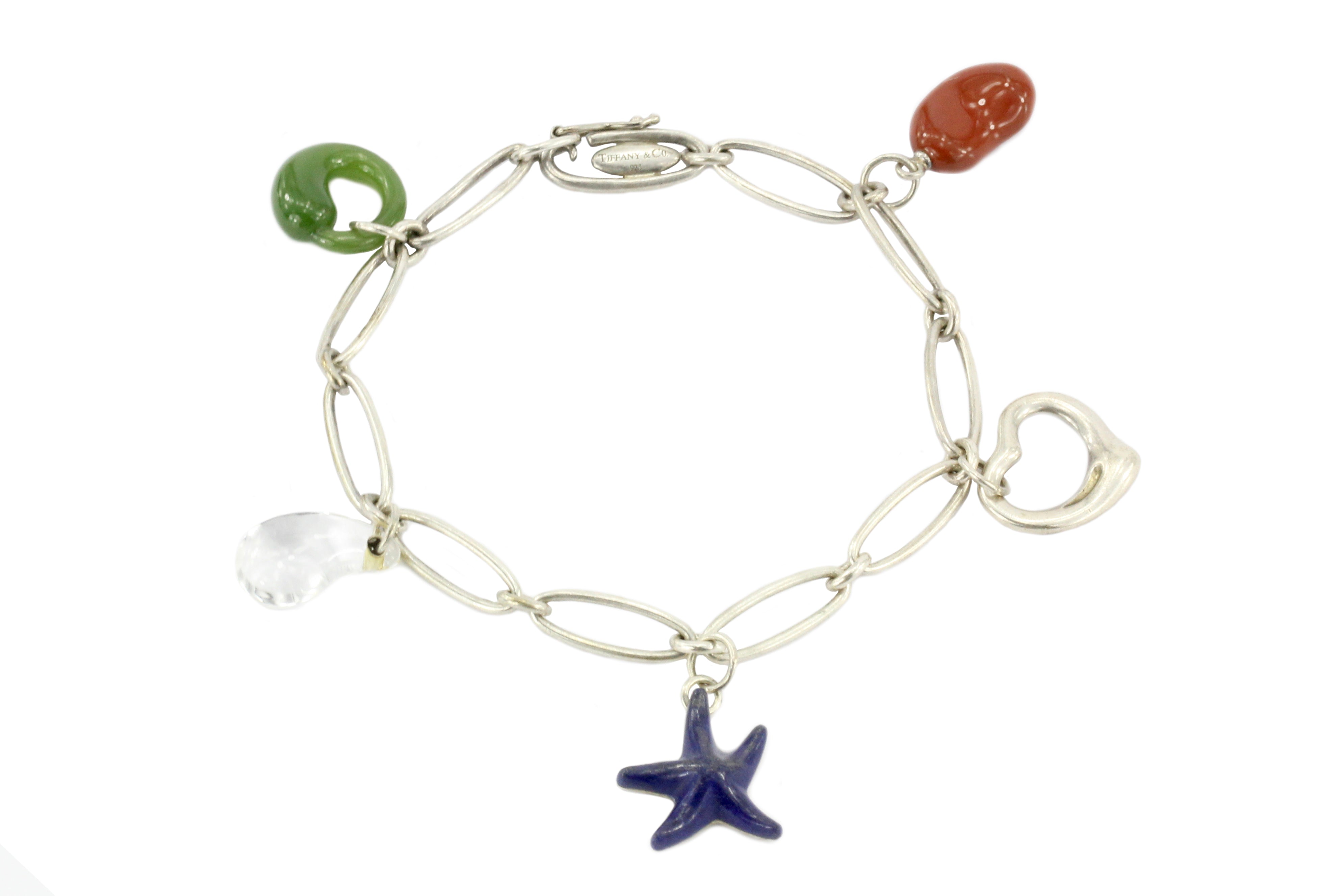 Tiffany & Co. Sterling Silver Multistage Five Charm Bracelet - Queen May