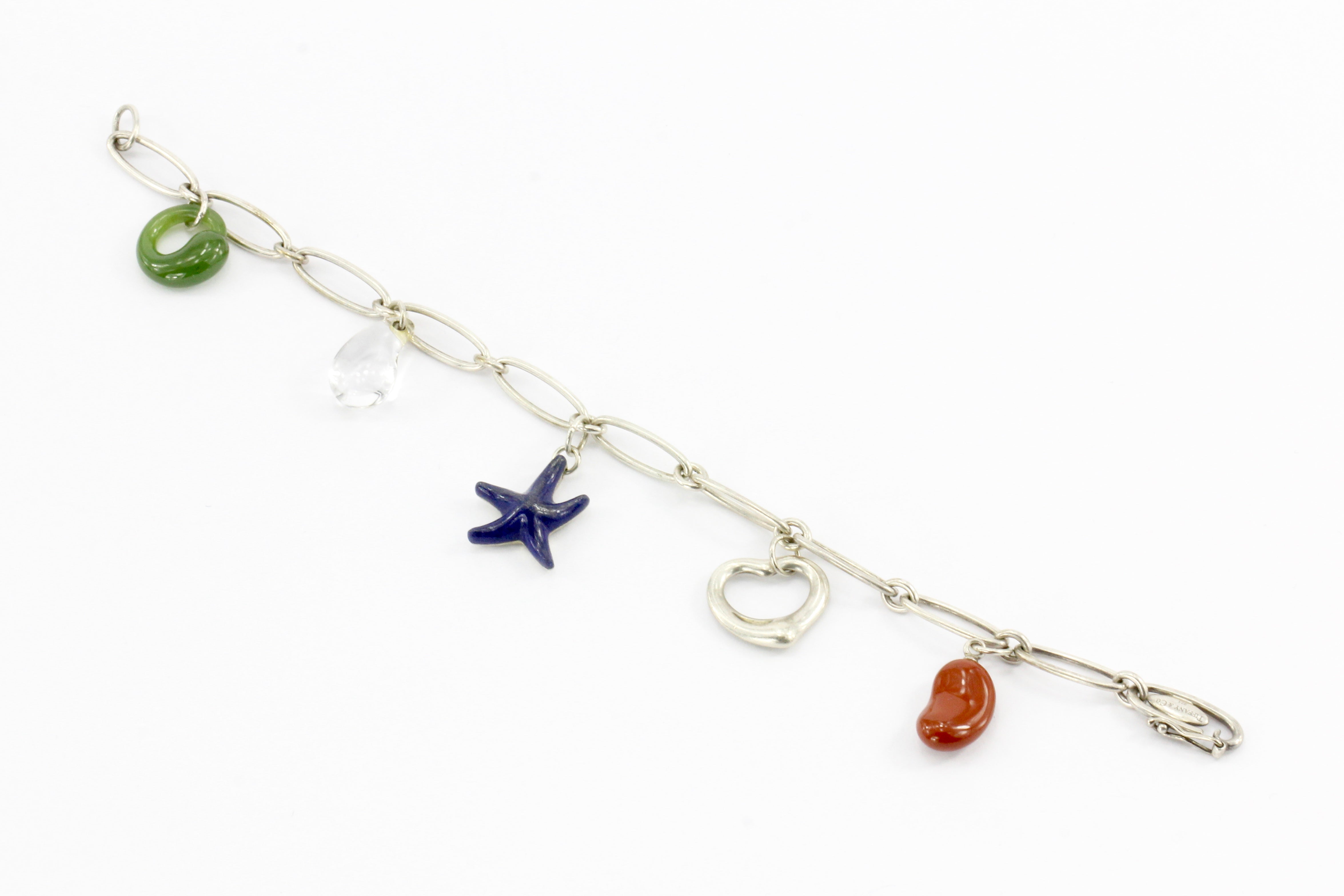 Tiffany & Co. Sterling Silver Multistage Five Charm Bracelet - Queen May