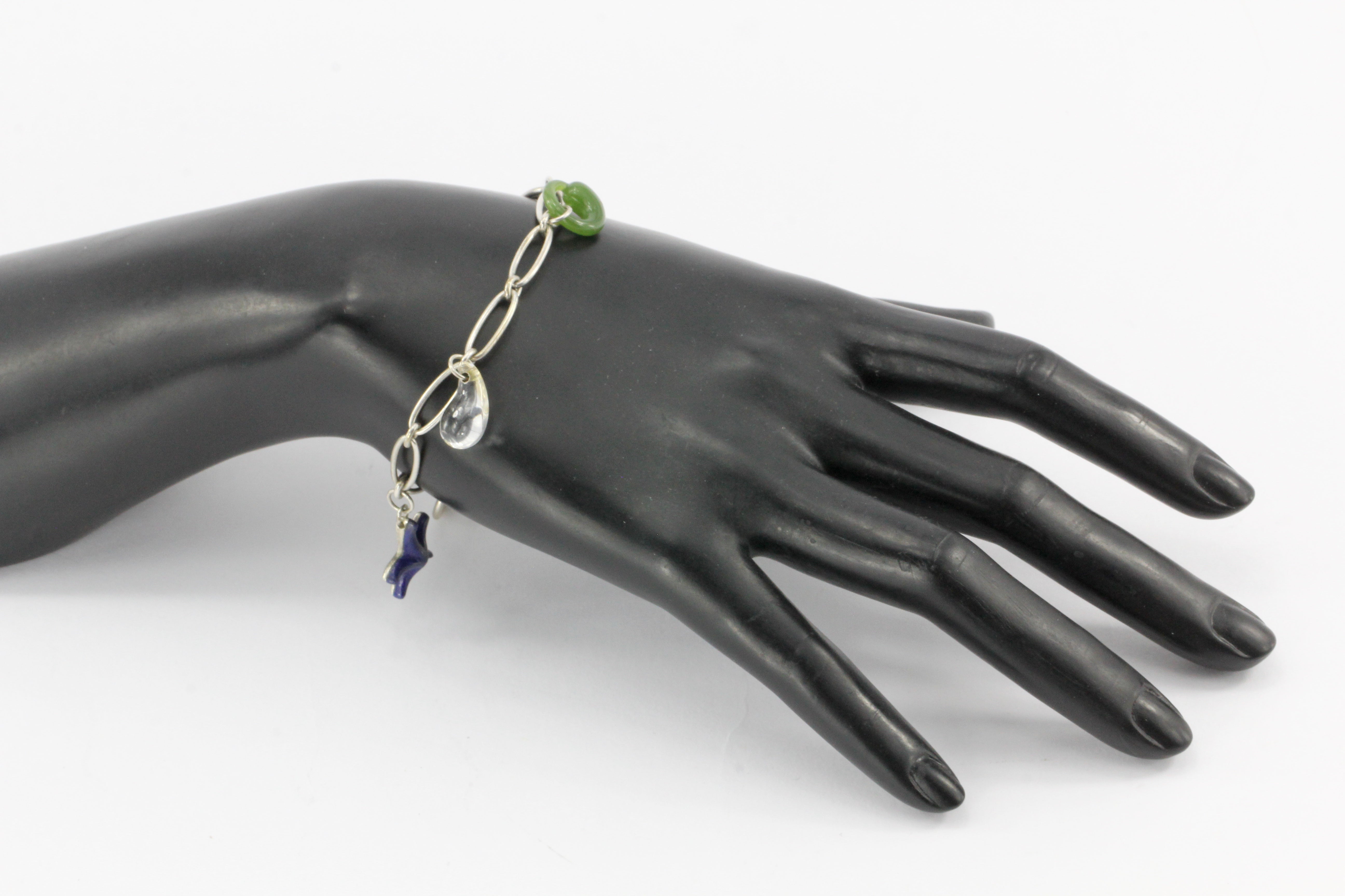 Tiffany & Co. Sterling Silver Multistage Five Charm Bracelet - Queen May