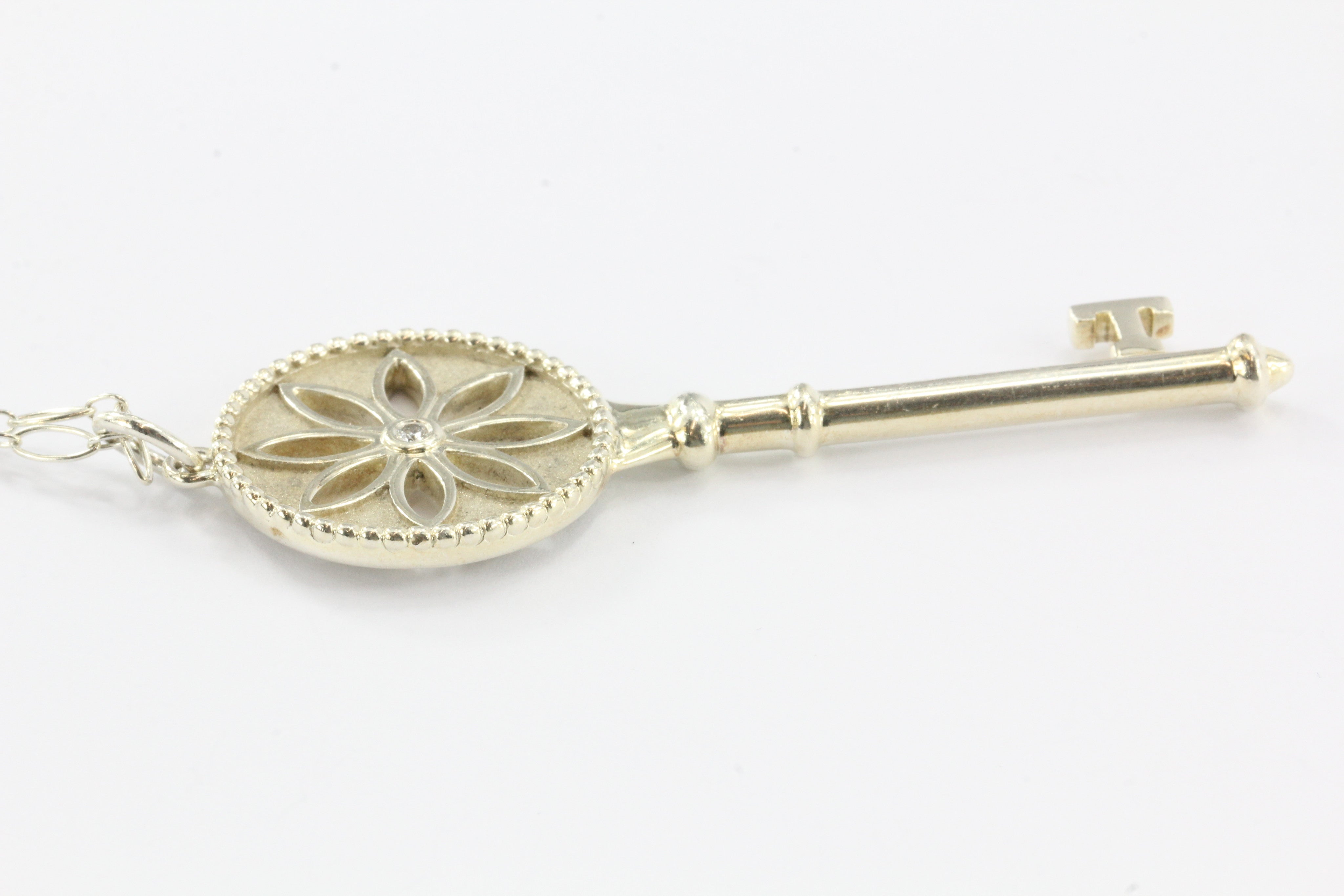 Tiffany & Co Sterling Silver Daisy Key Diamond Pendant & Chain - Queen May