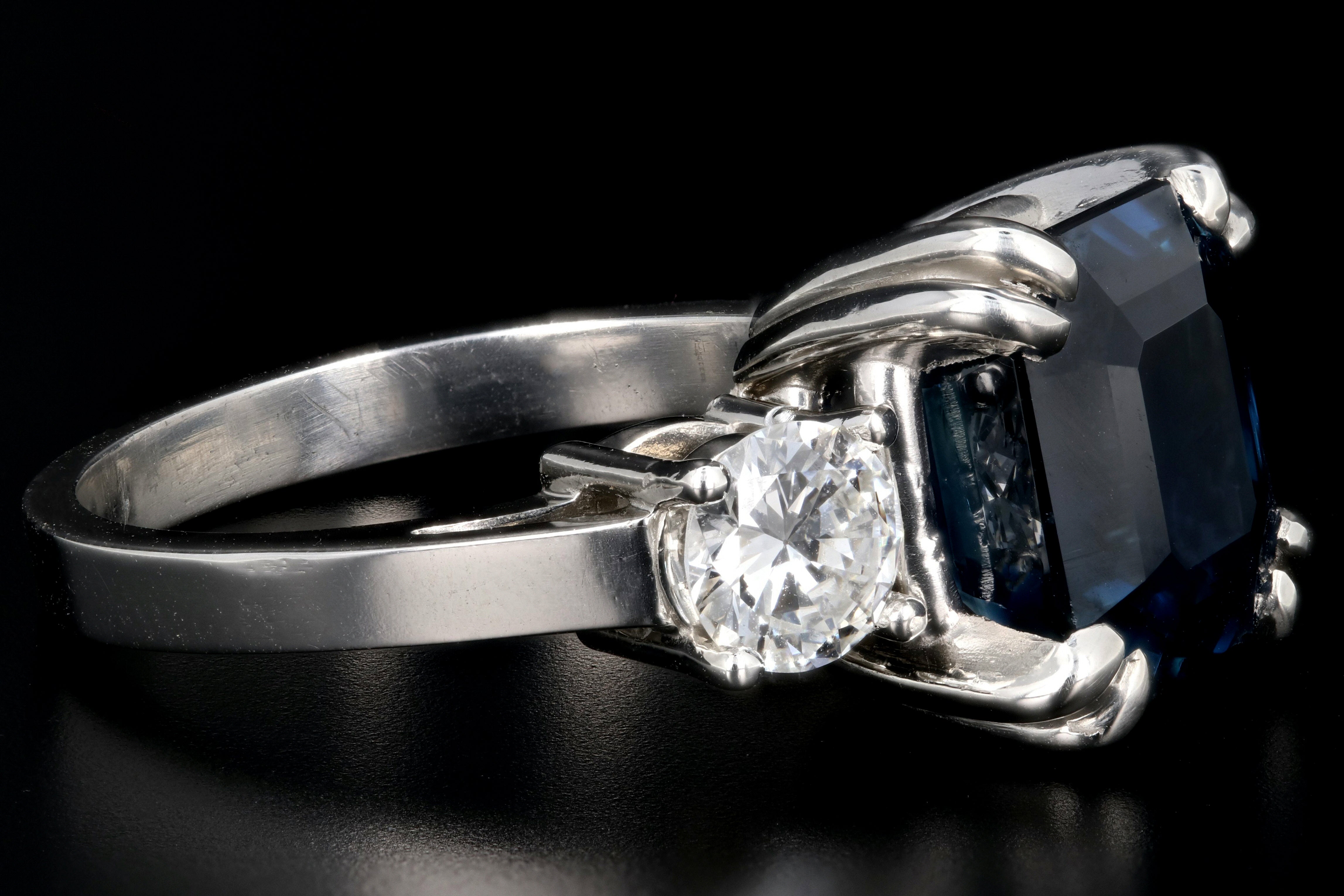 Modern Platinum AGL Certified 7.88 Carat Emerald Cut Sapphire and GIA Certified Diamond Ring - Queen May